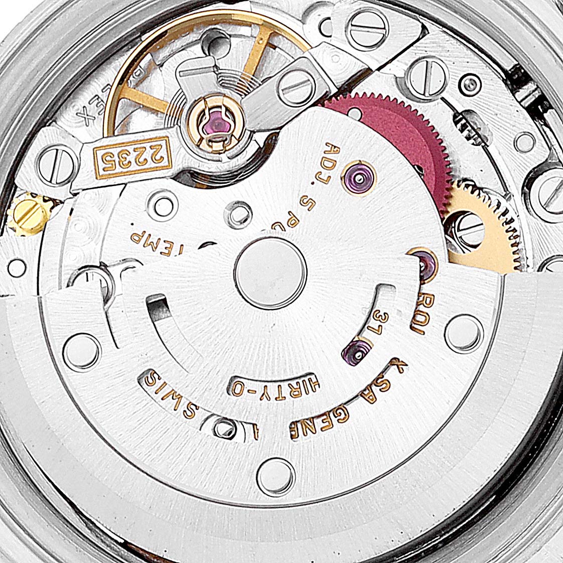 This is a close-up view of the movement mechanism of a Rolex Date 79240 Women's Stainless Steel Pink Dial 79240 Women's Stainless Steel Pink Dial model watch.