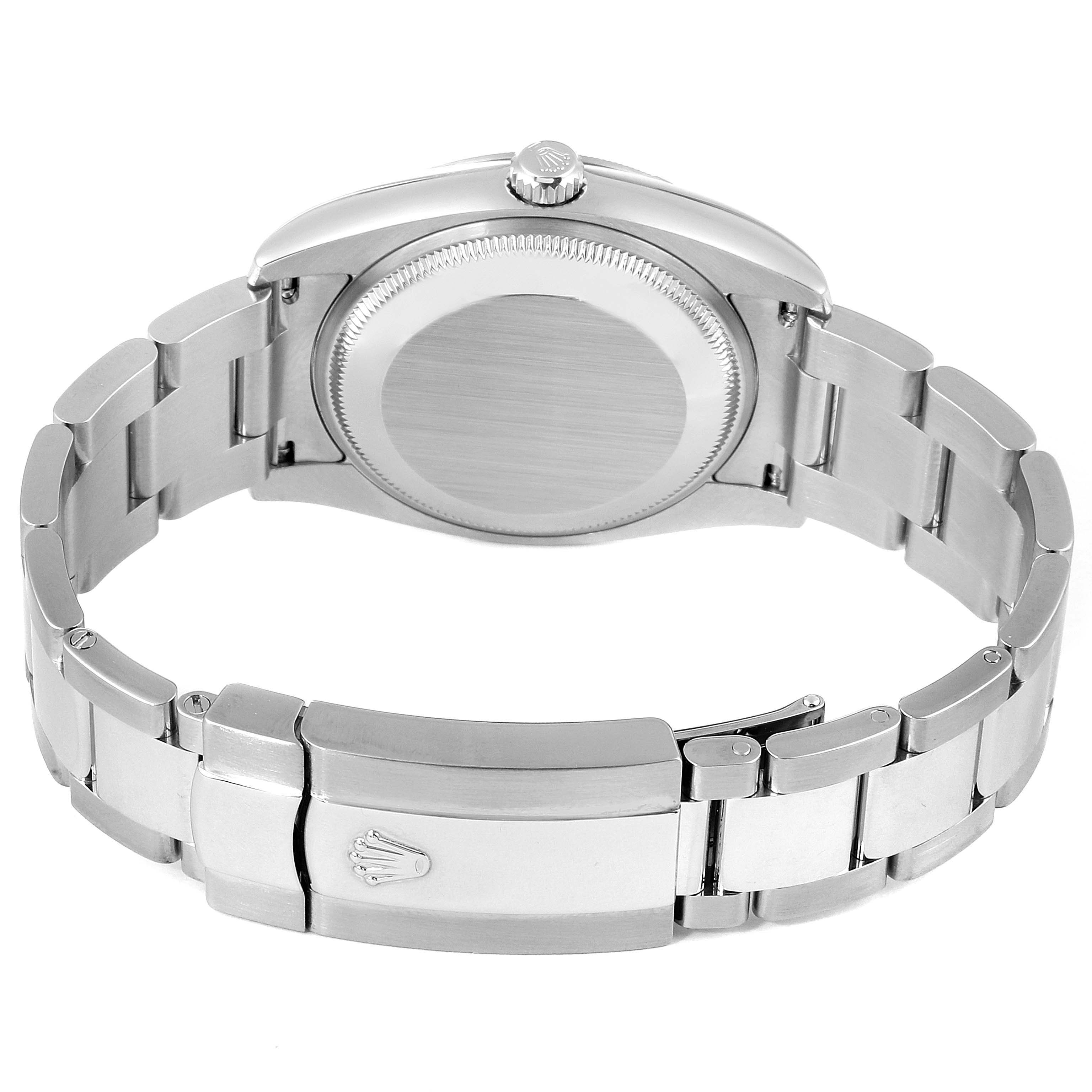 This is a rear view of the Rolex Date 115210 Men's Stainless Steel Blue Dial 115210 Men's Stainless Steel Blue Dial watch, showing the case back, bracelet, and clasp with the Rolex logo.