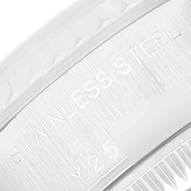 This is a close-up view of the caseback engraving on a Rolex Datejust 79174 Women's Stainless Steel Silver Dial 79174 Women's Stainless Steel Silver Dial watch, showing the text "STAINLESS STEEL" and partial serial number.
