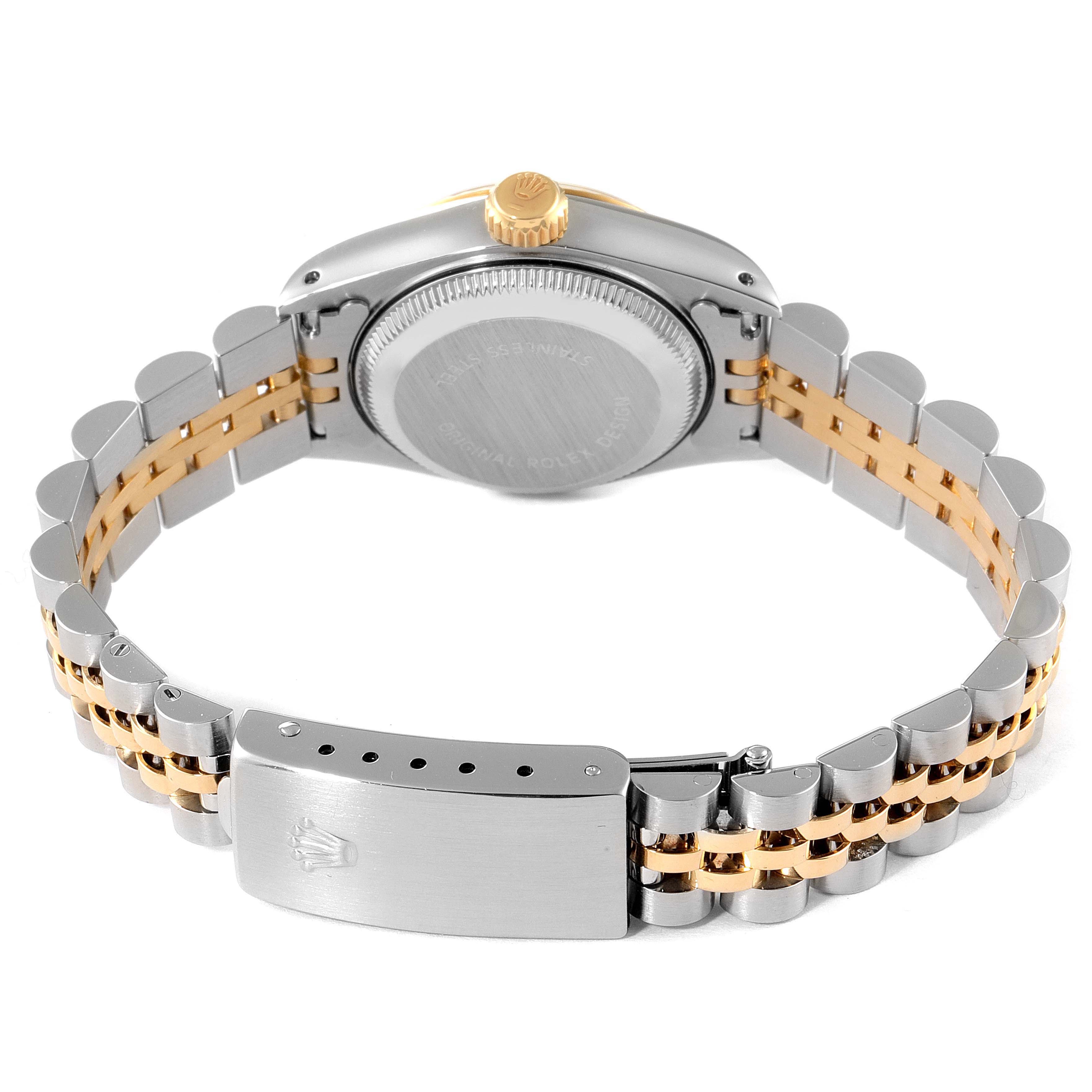 The image shows the back view of a Rolex Datejust 69173 Women
s Steel and Gold (two tone) Champagne Dial 69173 Women
s Steel and Gold (two tone) Champagne Dial watch, highlighting the case back and Jubilee bracelet.