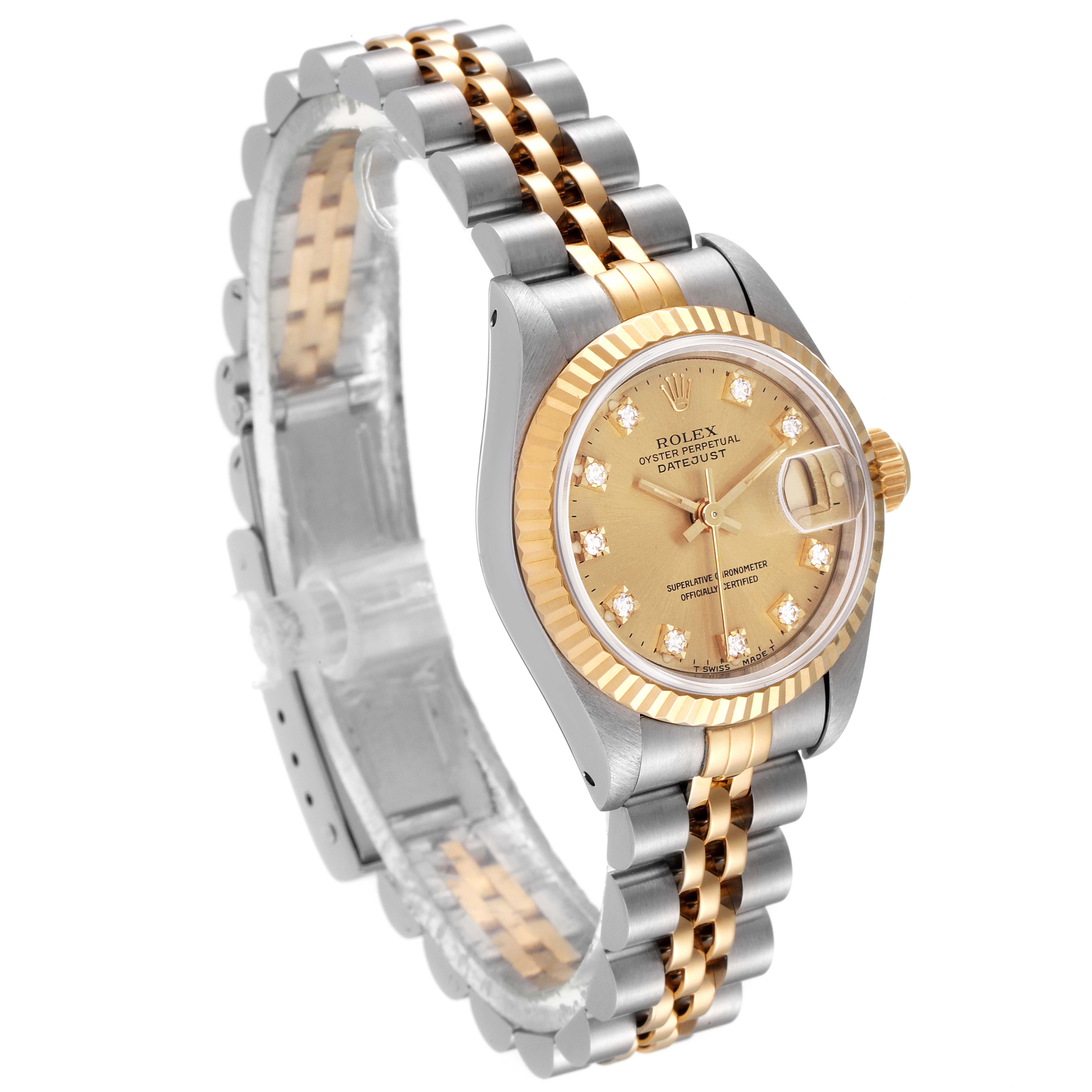 The image shows a Rolex Datejust 69173 Women
s Steel and Gold (two tone) Champagne Dial 69173 Women
s Steel and Gold (two tone) Champagne Dial watch from an angled side view, highlighting its two-tone bracelet and diamond-set dial.