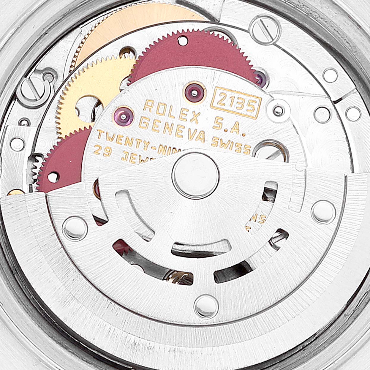 This image shows the detailed inner workings and mechanism of a Rolex Datejust 69173 Women's Steel and Gold (two tone) White Dial 69173 Women's Steel and Gold (two tone) White Dial watch movement, featuring gears and the rotor.