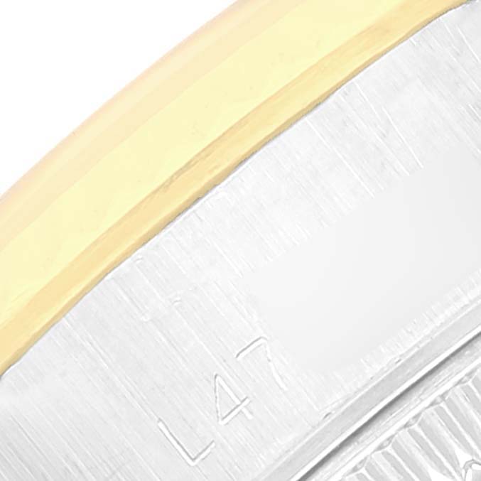 This image shows a close-up of the side of a Datejust model by Rolex, highlighting part of the bezel and case.