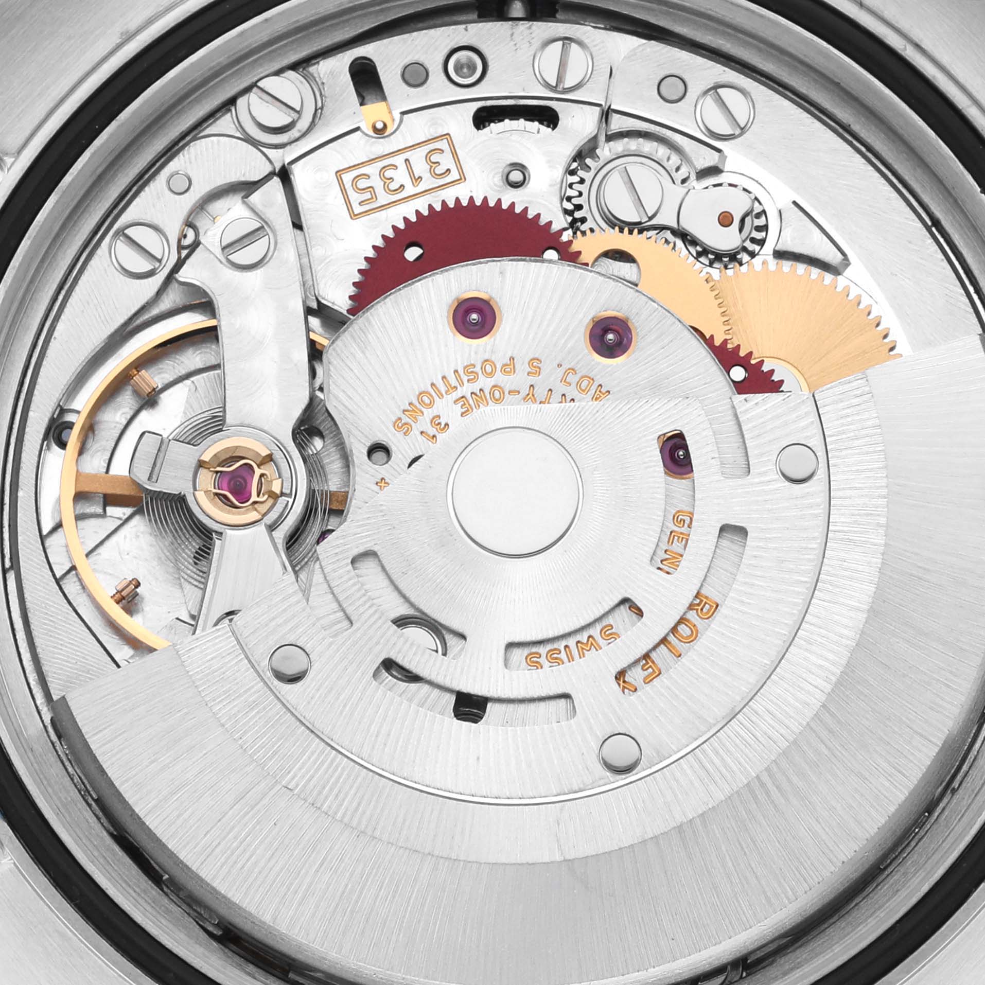This image shows the intricate movement of a Rolex Datejust 116201 Men's Steel and Gold (two tone) Pink Dial 116201 Men's Steel and Gold (two tone) Pink Dial watch, highlighting gears and mechanical components from the back angle.