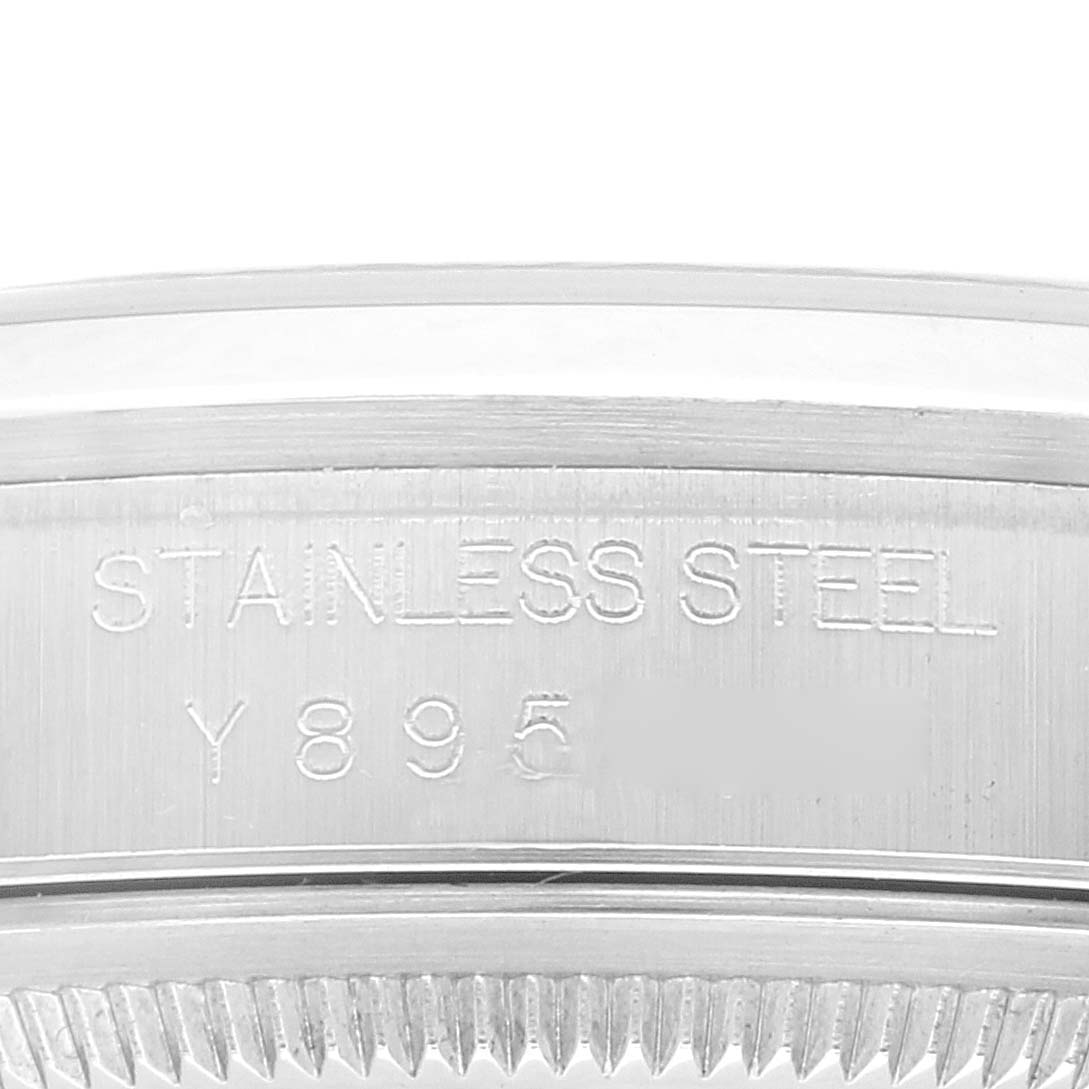 This image shows a close-up of the case back engraving of a Rolex Datejust 16200 Men's Stainless Steel Black Dial 16200 Men's Stainless Steel Black Dial watch, highlighting the stainless steel inscription.