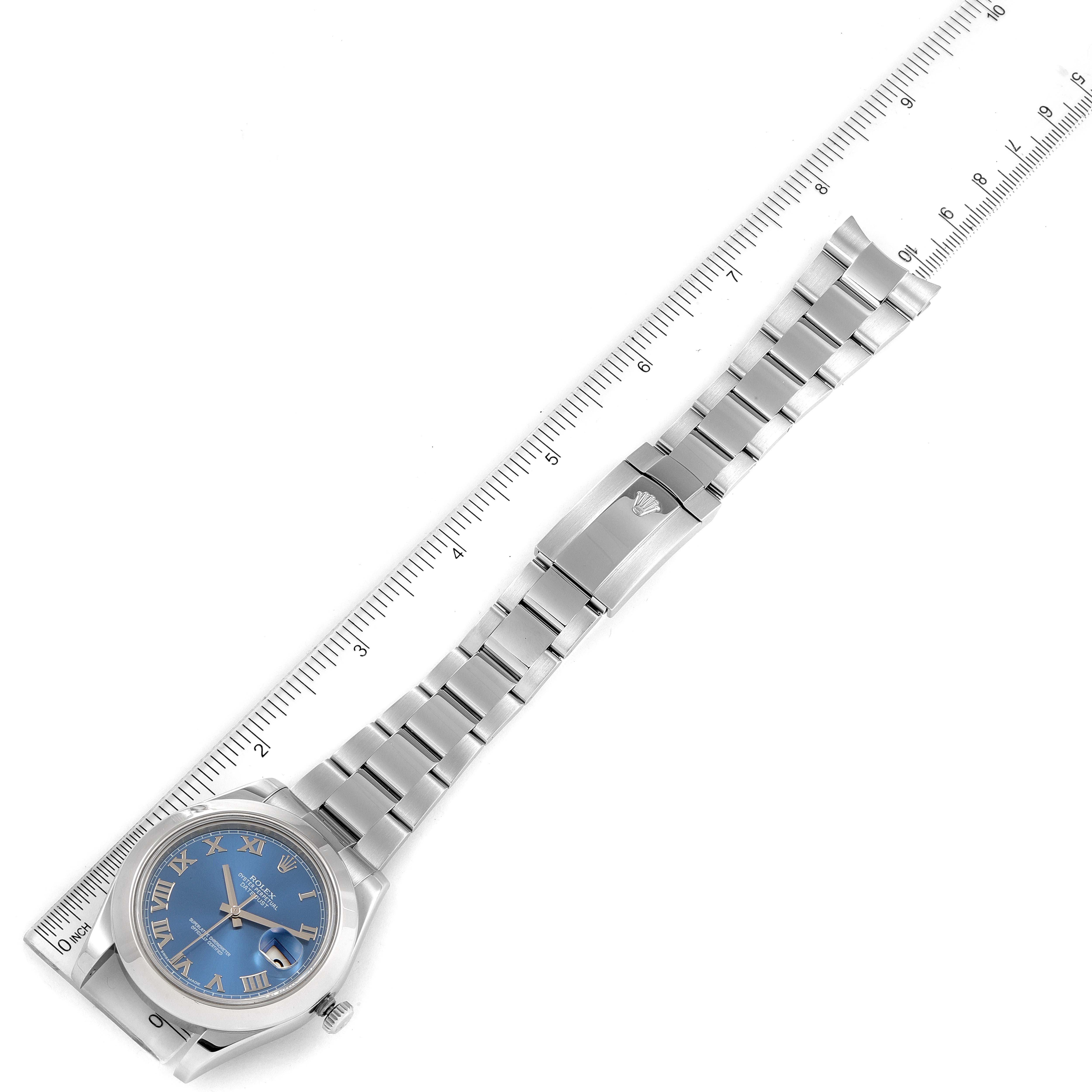 The Rolex Datejust 41 116300 Men's Stainless Steel Blue Dial 116300 Men's Stainless Steel Blue Dial watch is shown from a top-down angle, featuring the face, bracelet, and clasp alongside a ruler for size reference.