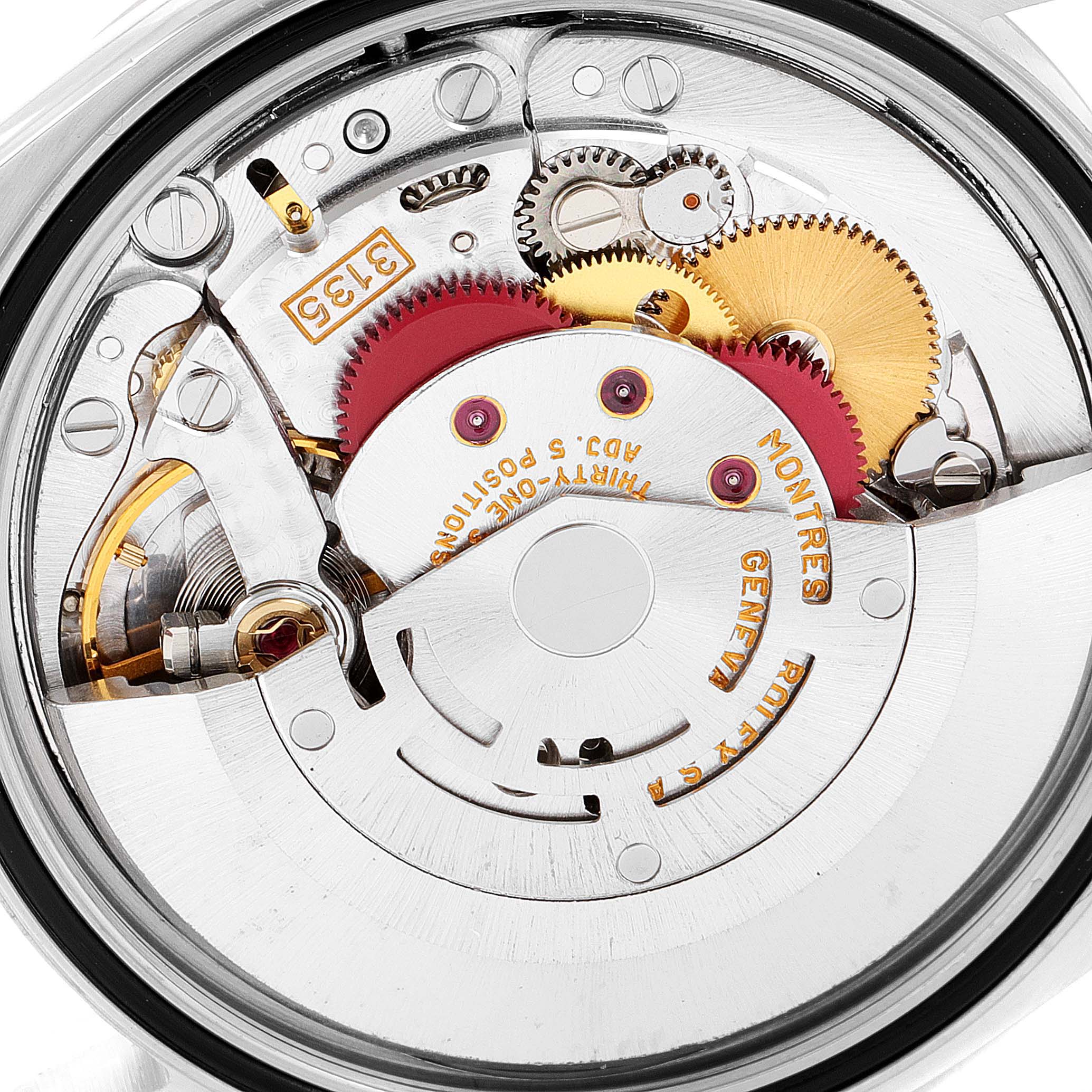 This image shows the intricate internal mechanism and gears of a Rolex Datejust 16233 Men's Steel and Gold (two tone) Grey Dial 16233 Men's Steel and Gold (two tone) Grey Dial watch, viewed from the back angle.