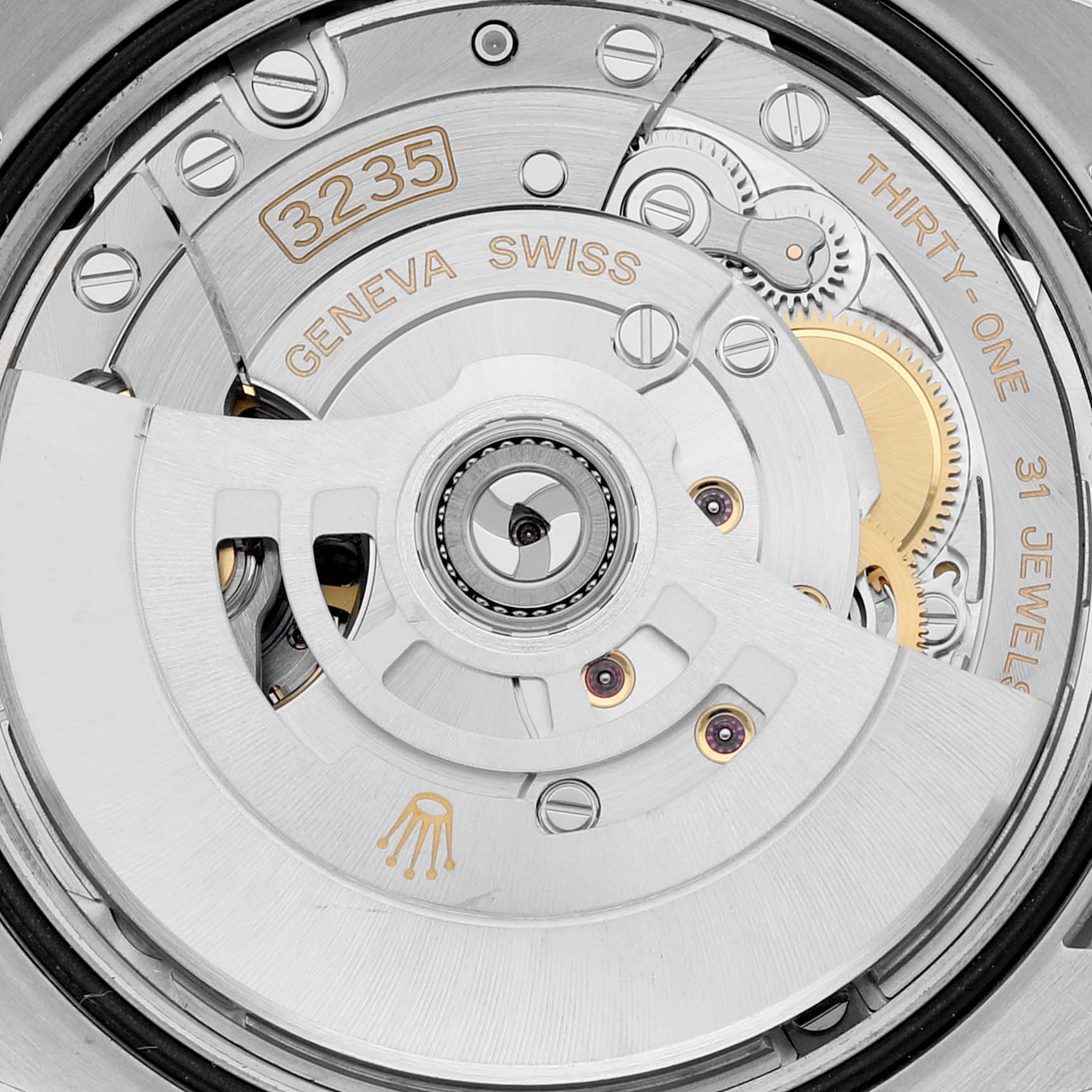 The image shows a close-up of the movement mechanism of a Rolex Datejust 126234 Men's Stainless Steel Purple Dial 126234 Men's Stainless Steel Purple Dial watch, highlighting the 3235 caliber and intricate details.