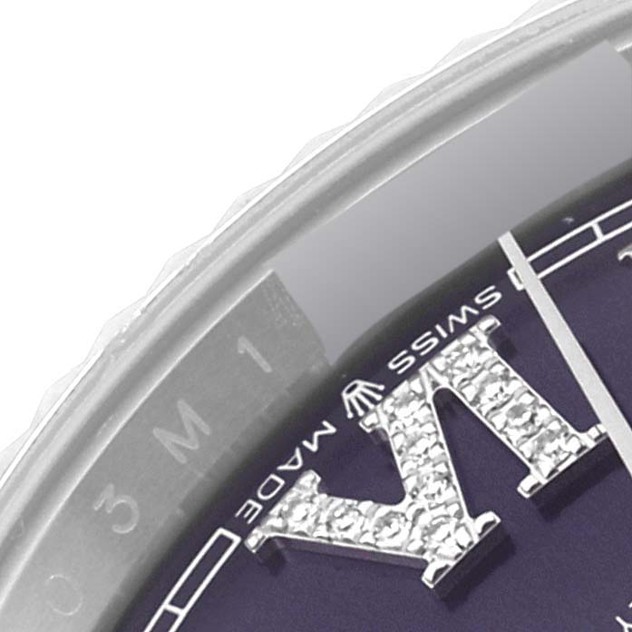 The image shows a close-up of the dial and part of the bezel of a Rolex Datejust 126234 Men's Stainless Steel Purple Dial 126234 Men's Stainless Steel Purple Dial watch.