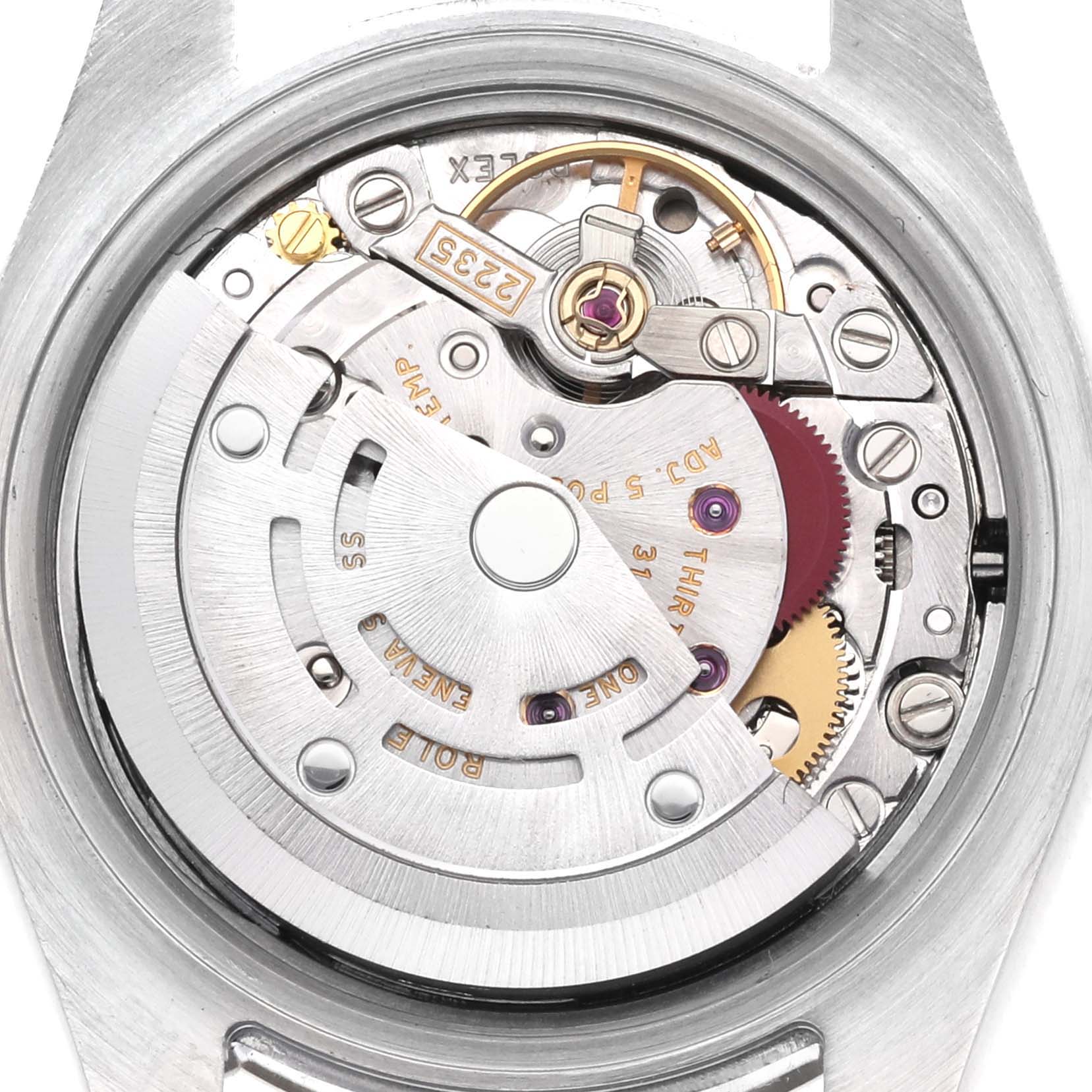 The image shows the movement of a Rolex Cocktail 179174 Women
s Stainless Steel Silver Dial 179174 Women
s Stainless Steel Silver Dial model watch from a rear angle, highlighting the intricate gears and components.
