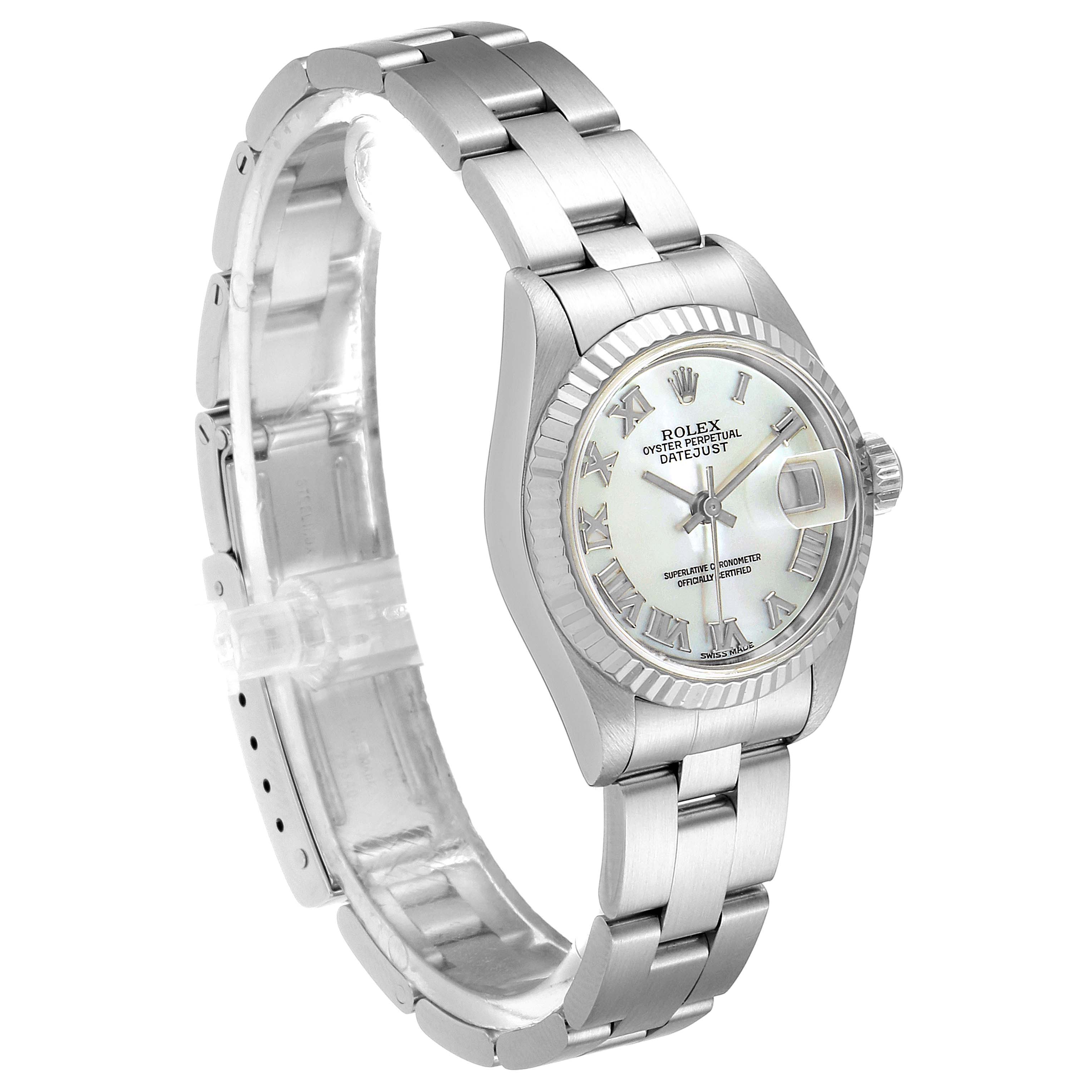 The image shows a side angle view of the Rolex Datejust 69174 Women's Stainless Steel Mother of Pearl Dial 69174 Women's Stainless Steel Mother of Pearl Dial watch, highlighting its bracelet, dial, and fluted bezel.