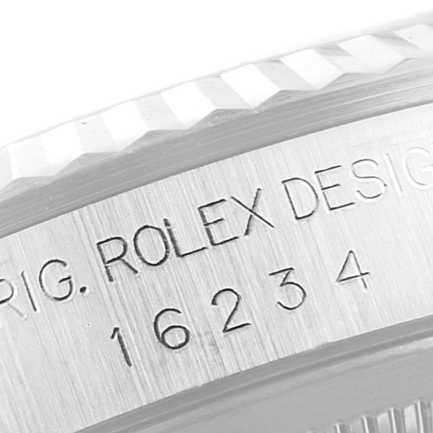 The image shows an angled close-up of the casing edge, model number, and part of the bezel of a Rolex Datejust 16234 Men's Stainless Steel Silver Dial 16234 Men's Stainless Steel Silver Dial watch.