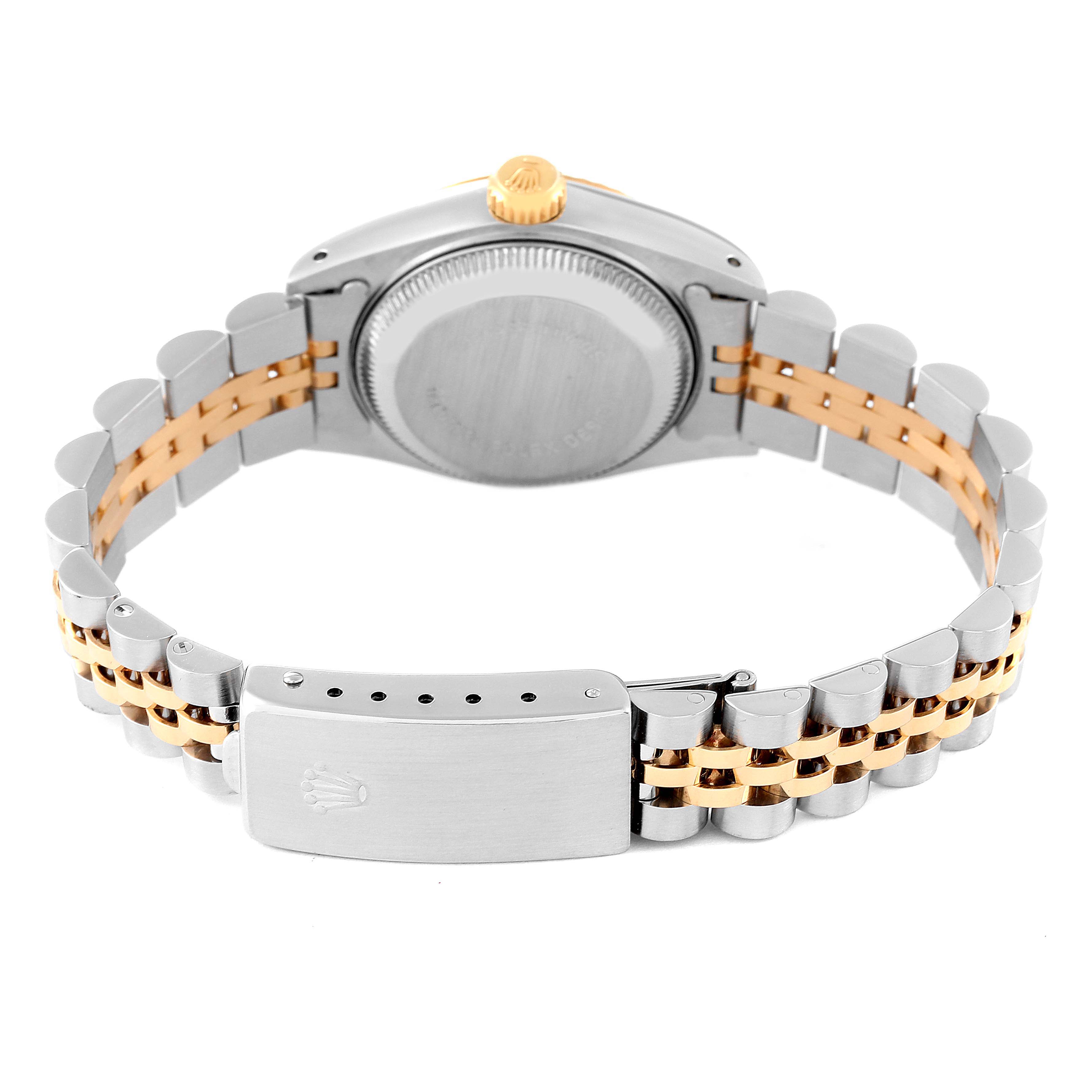 The image shows the back view of a Rolex Datejust 69173 Women's Steel and Gold (two tone) Champagne Dial 69173 Women's Steel and Gold (two tone) Champagne Dial watch, highlighting its case, crown, and Jubilee bracelet.