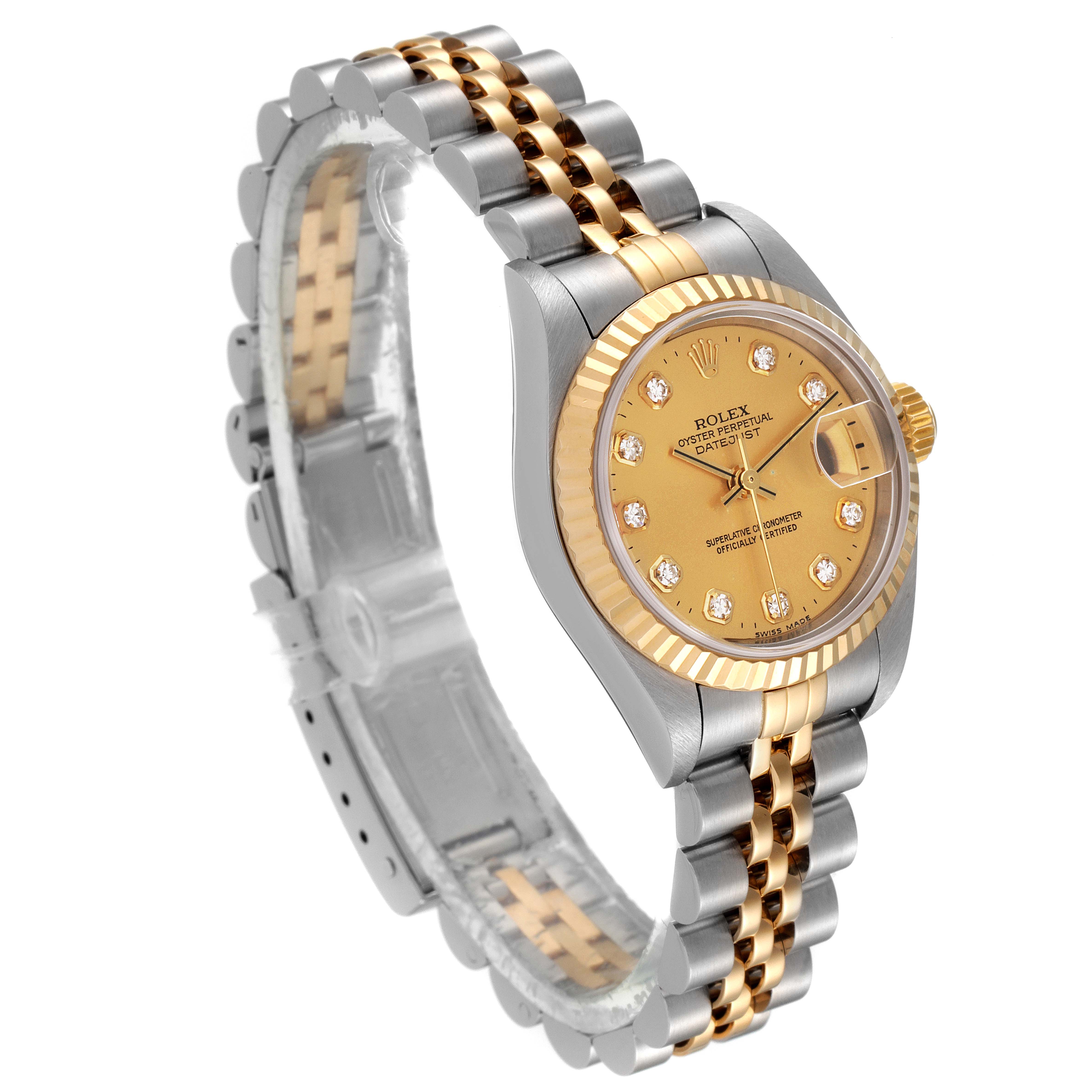 The image shows a Rolex Datejust 79173 Women
s Steel and Gold (two tone) Champagne Dial 79173 Women
s Steel and Gold (two tone) Champagne Dial watch at an angled view, highlighting the two-tone bracelet, gold dial, and diamond hour markers.