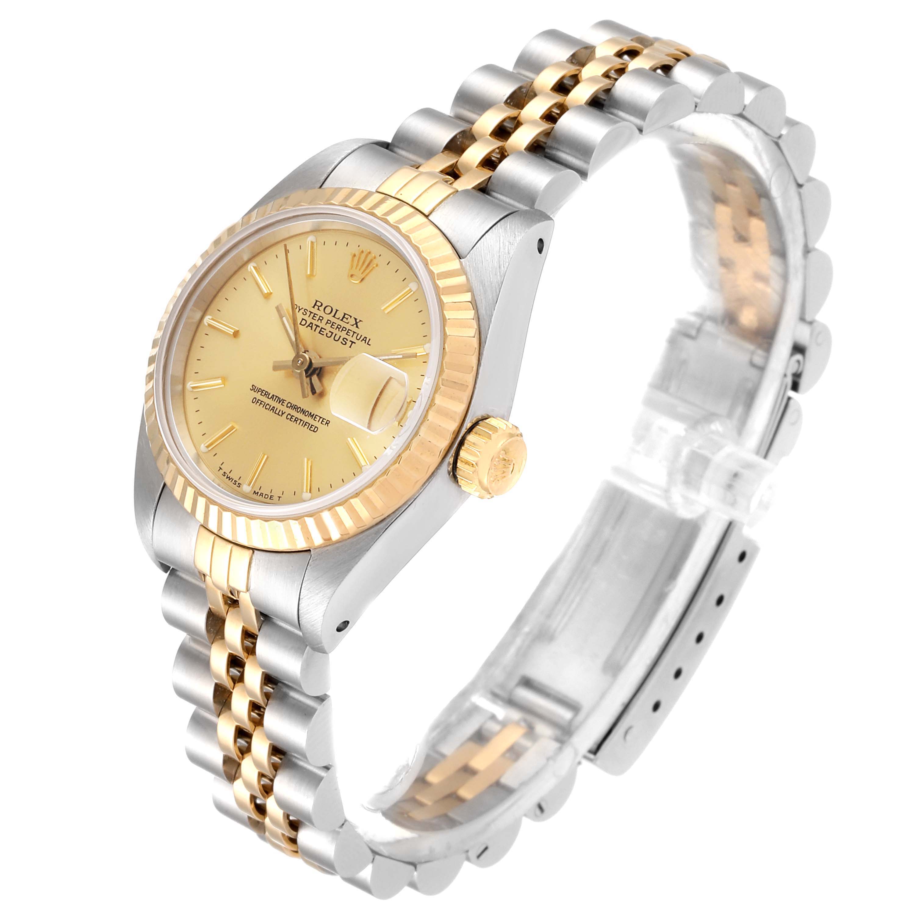 The Rolex Datejust 69173 Women's Steel and Gold (two tone) Champagne Dial 69173 Women's Steel and Gold (two tone) Champagne Dial watch is shown from a three-quarter angle, displaying its face, bezel, crown, and two-tone bracelet.