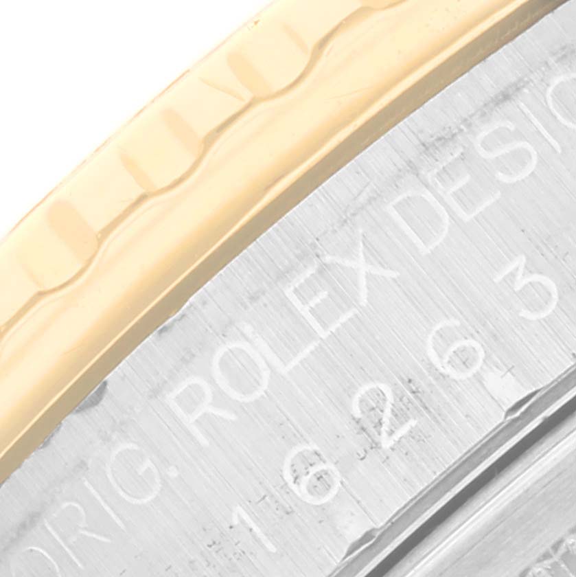 The image shows a close-up of the bezel and engraved edge of the Rolex Turn-o-Graph 16263 Men's Steel and Gold (two tone) Black Dial 16263 Men's Steel and Gold (two tone) Black Dial watch.