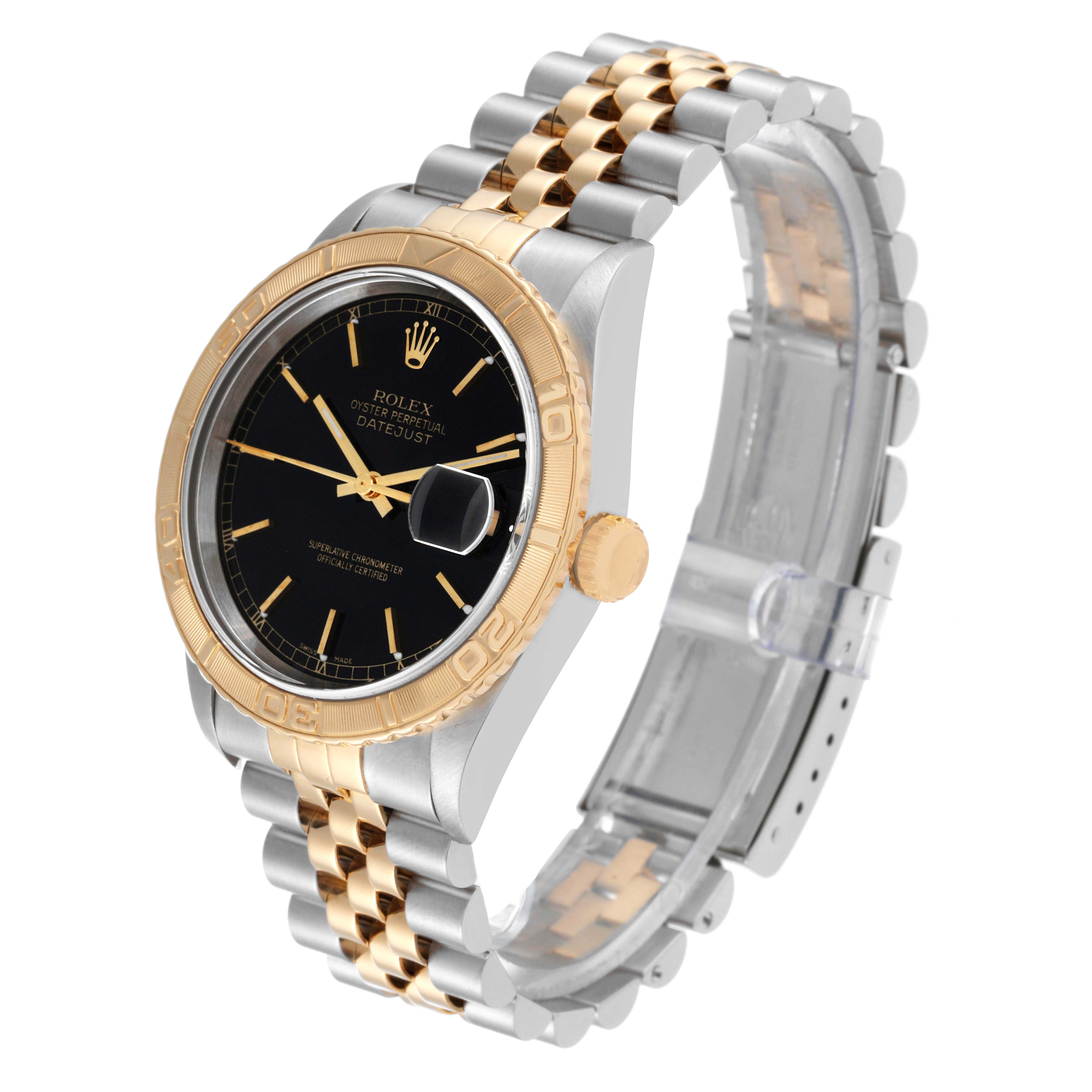 The image displays a side angle of the Rolex Turn-o-Graph 16263 Men's Steel and Gold (two tone) Black Dial 16263 Men's Steel and Gold (two tone) Black Dial, highlighting its black dial, gold bezel, and two-tone bracelet.