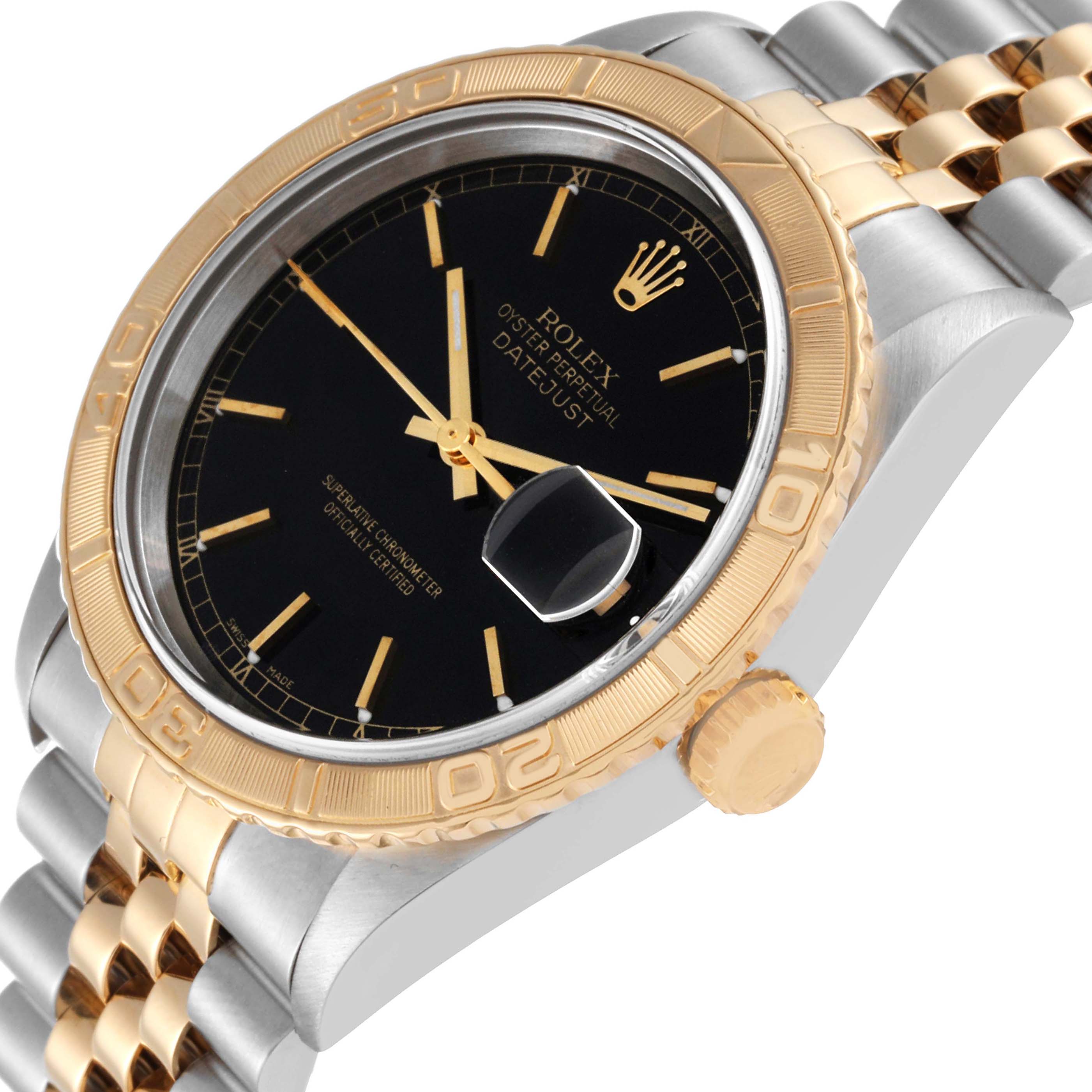 This image shows a close-up angle of a Rolex Turn-o-Graph 16263 Men's Steel and Gold (two tone) Black Dial 16263 Men's Steel and Gold (two tone) Black Dial watch, highlighting the bezel, dial, hands, and part of the bracelet.