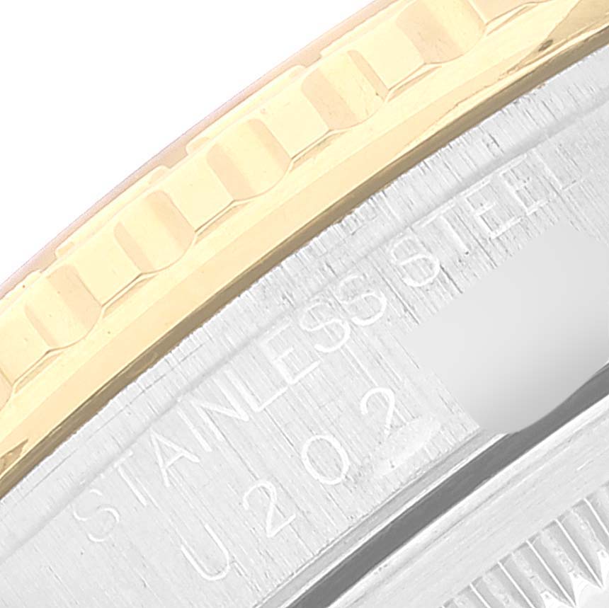 This close-up image shows the stainless steel and gold bezel of a Rolex Turn-o-Graph 16263 Men
s Steel and Gold (two tone) White Dial 16263 Men
s Steel and Gold (two tone) White Dial watch.