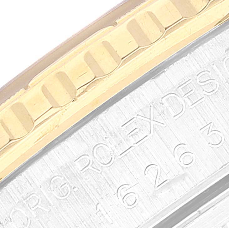 Close-up image of the bezel and part of the engraving on a Rolex Turn-o-Graph 16263 Men
s Steel and Gold (two tone) White Dial 16263 Men
s Steel and Gold (two tone) White Dial watch.