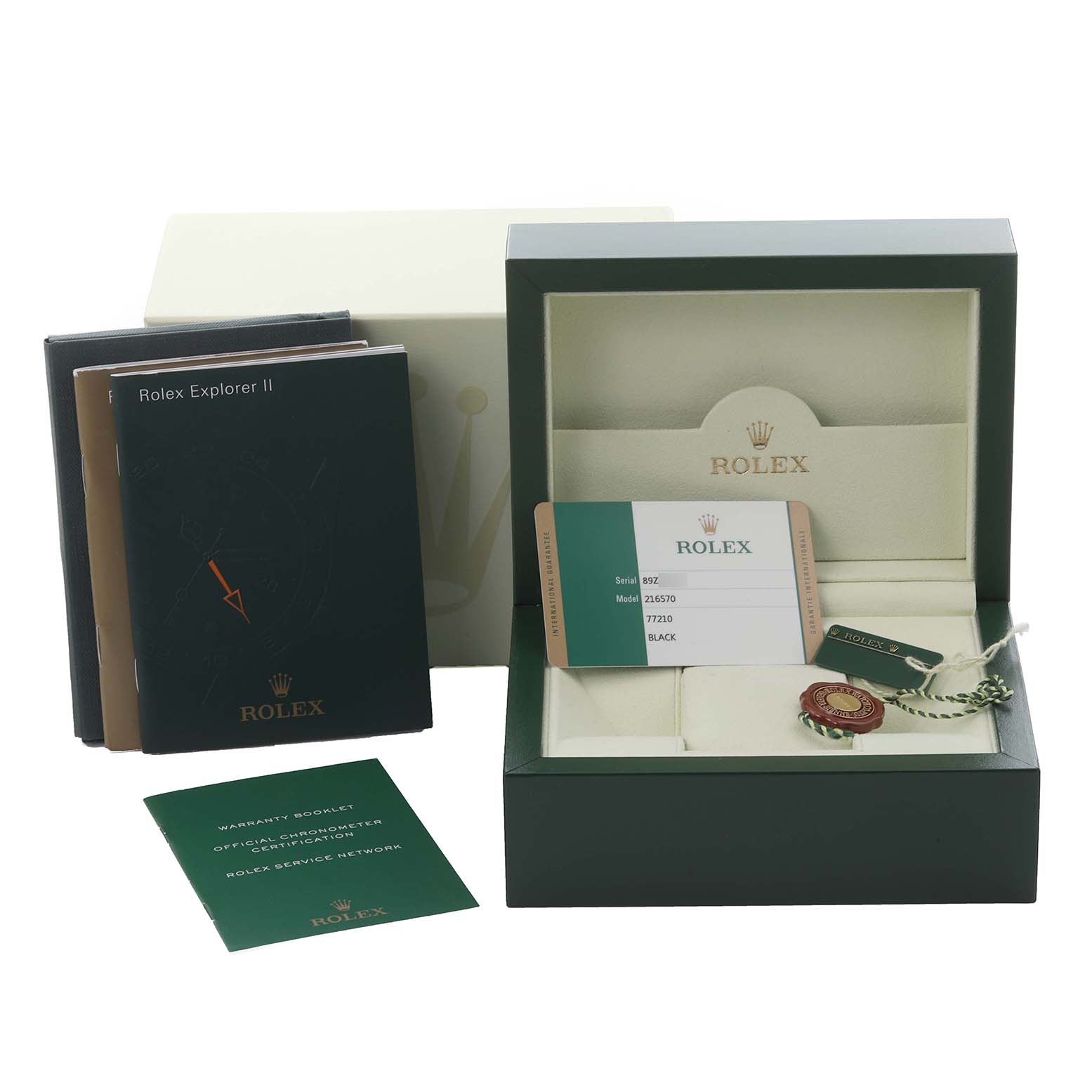 The image shows a Rolex Explorer 216570 Men's Stainless Steel Black Dial 216570 Men's Stainless Steel Black Dial watch box, warranty card, and booklets from a front angle.