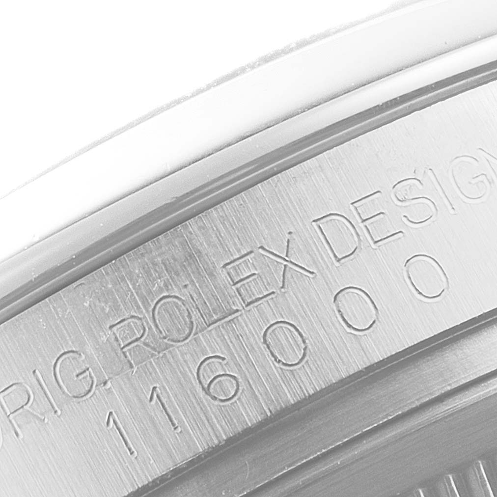 This is a close-up image of the engraved case back of a Rolex Air-King 116000 Men's Stainless Steel Blue Dial 116000 Men's Stainless Steel Blue Dial watch, showing the model number 116000.