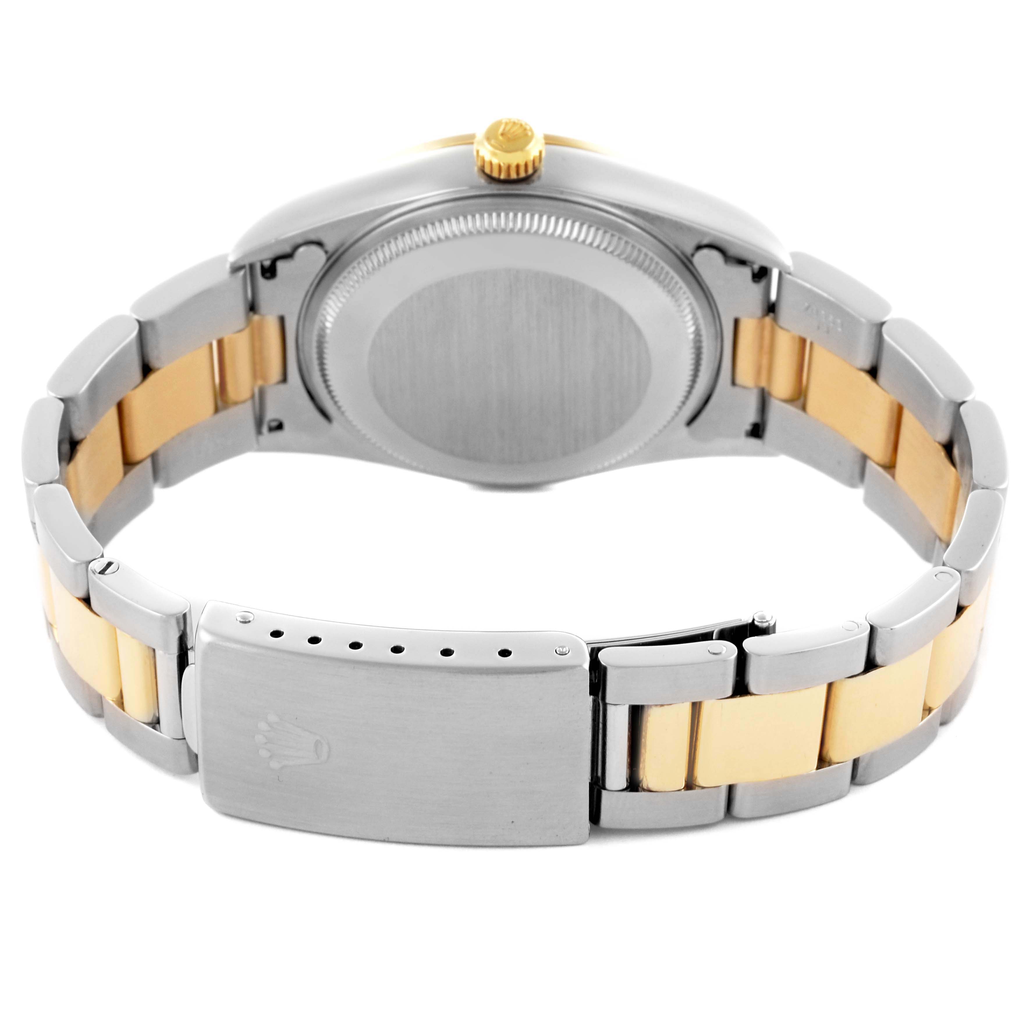 The image shows the back and clasp of a Rolex Oyster Perpetual 14203 Men's Steel and Gold (two tone) Grey Dial 14203 Men's Steel and Gold (two tone) Grey Dial watch with its two-tone bracelet.