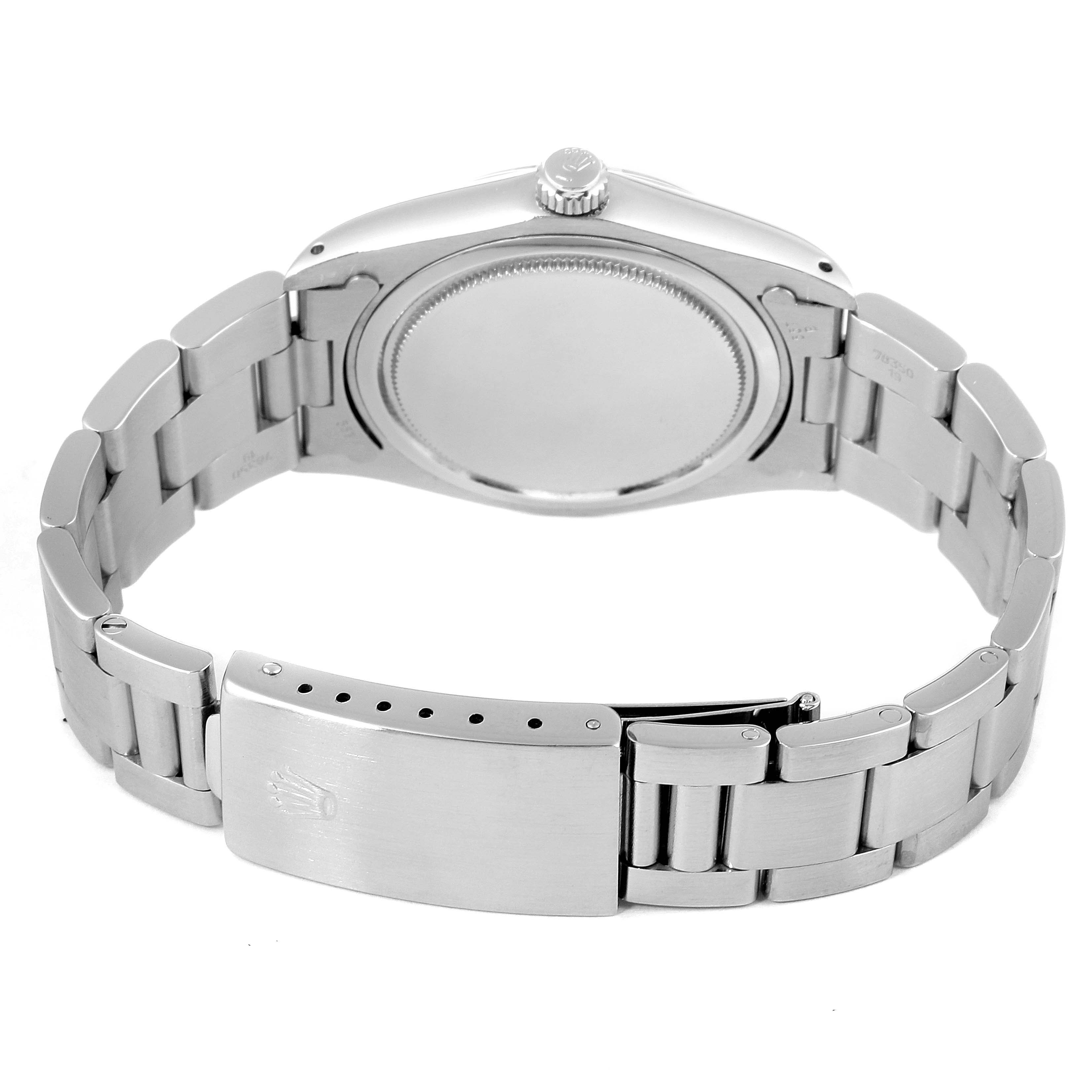 The image shows the back view of the Rolex Vintage Collection 6694 Men's Stainless Steel Black Dial 6694 Men's Stainless Steel Black Dial watch, focusing on its clasp and link bracelet.