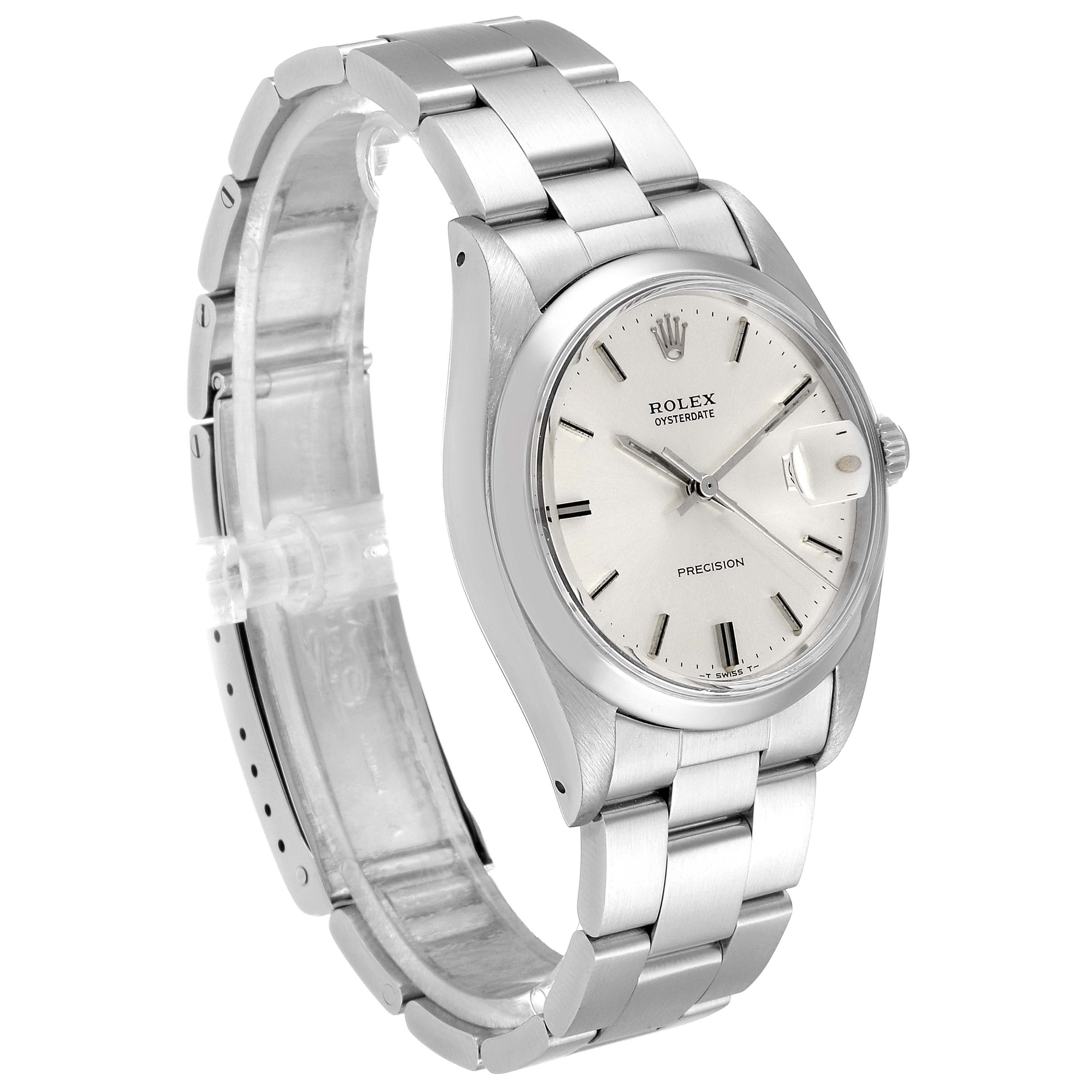 The image shows a side angle of the Rolex Vintage Collection 6694 Men's Stainless Steel Silver Dial 6694 Men's Stainless Steel Silver Dial Oysterdate watch, displaying the face, bracelet, and case.