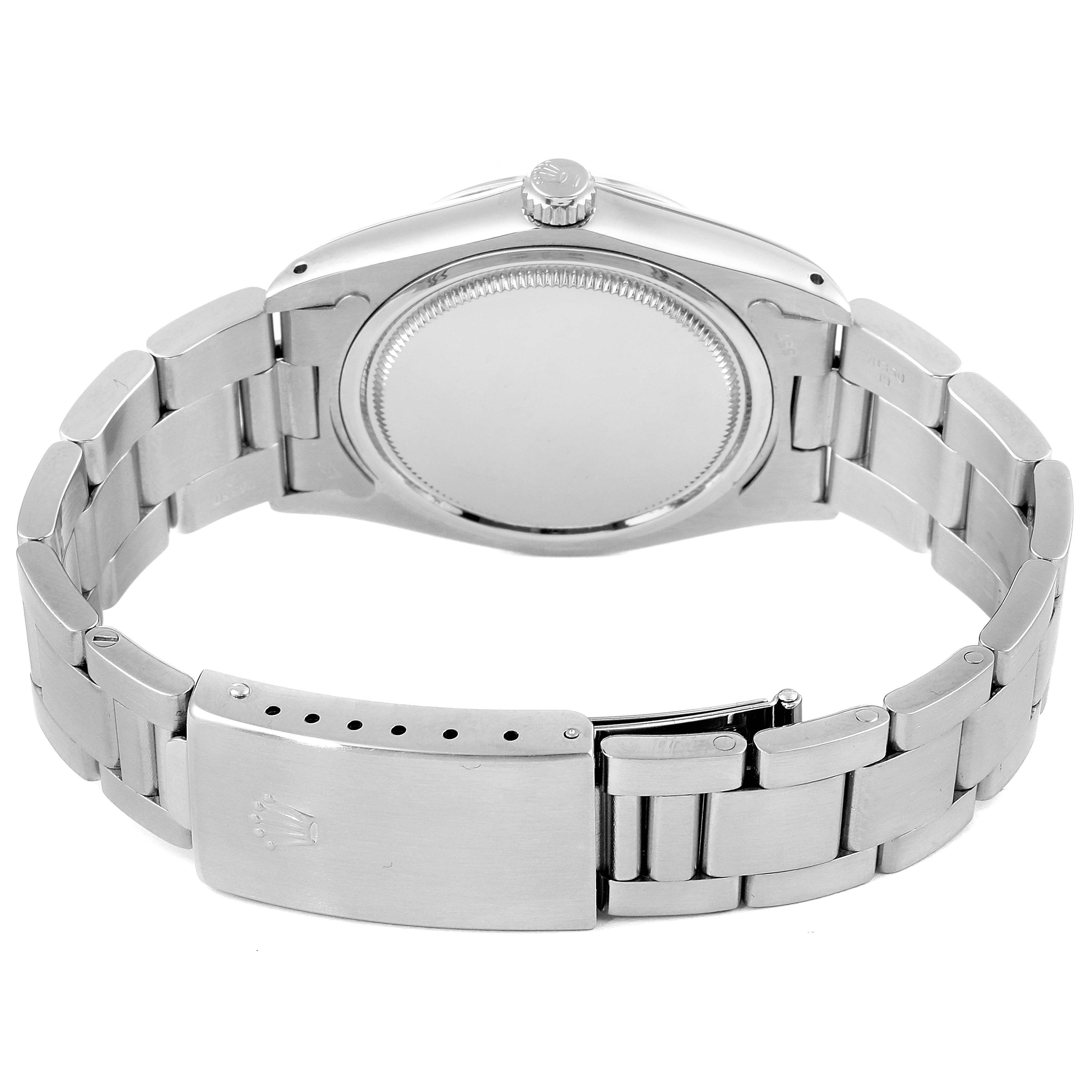 The image shows the back and clasp of a Vintage Collection Rolex watch from a rear angle.