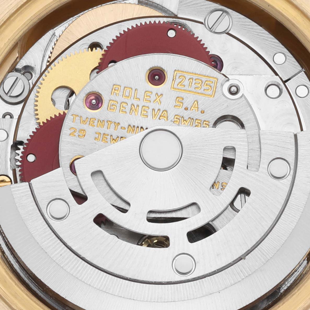The image shows the inner mechanism and rotor of a Rolex Pearlmaster watch at a close-up angle, highlighting its intricate components.