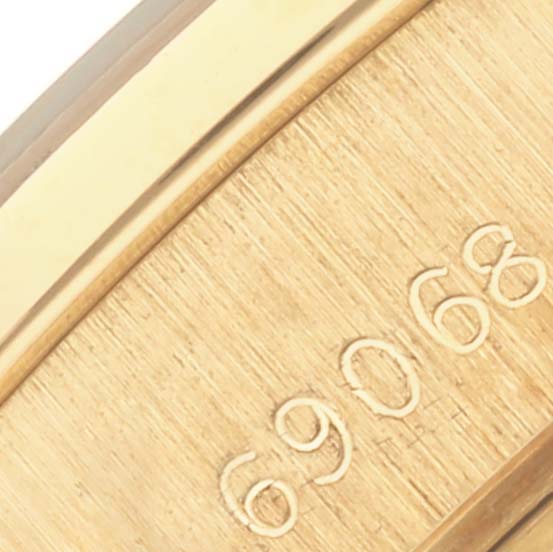 The image shows a close-up of the underside of the Rolex Pearlmaster bracelet with engraved numbers.
