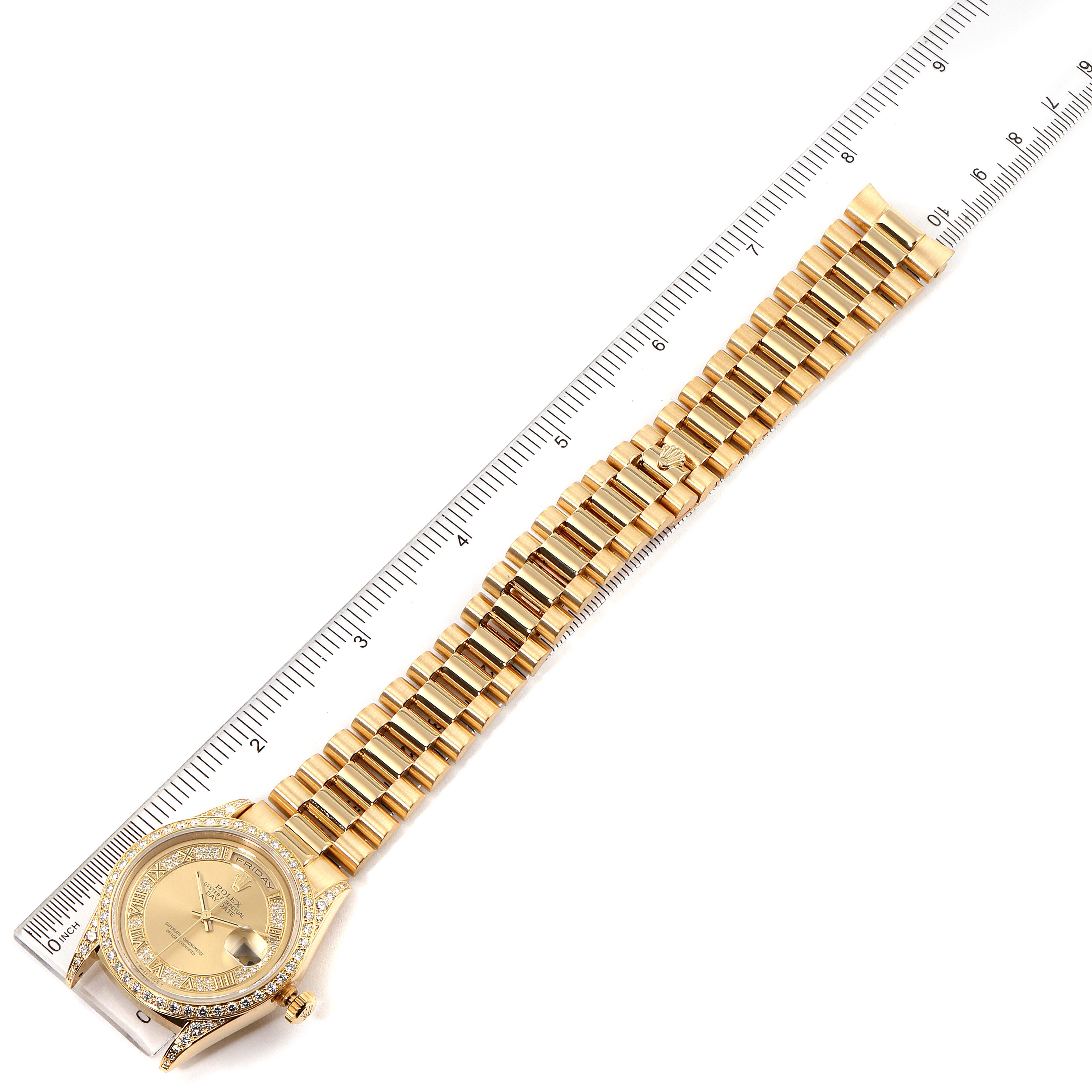 This image shows a Rolex President 18388 Men's Yellow Gold Champagne Dial 18388 Men's Yellow Gold Champagne Dial watch laying flat, with the full length visible alongside a ruler for scale.