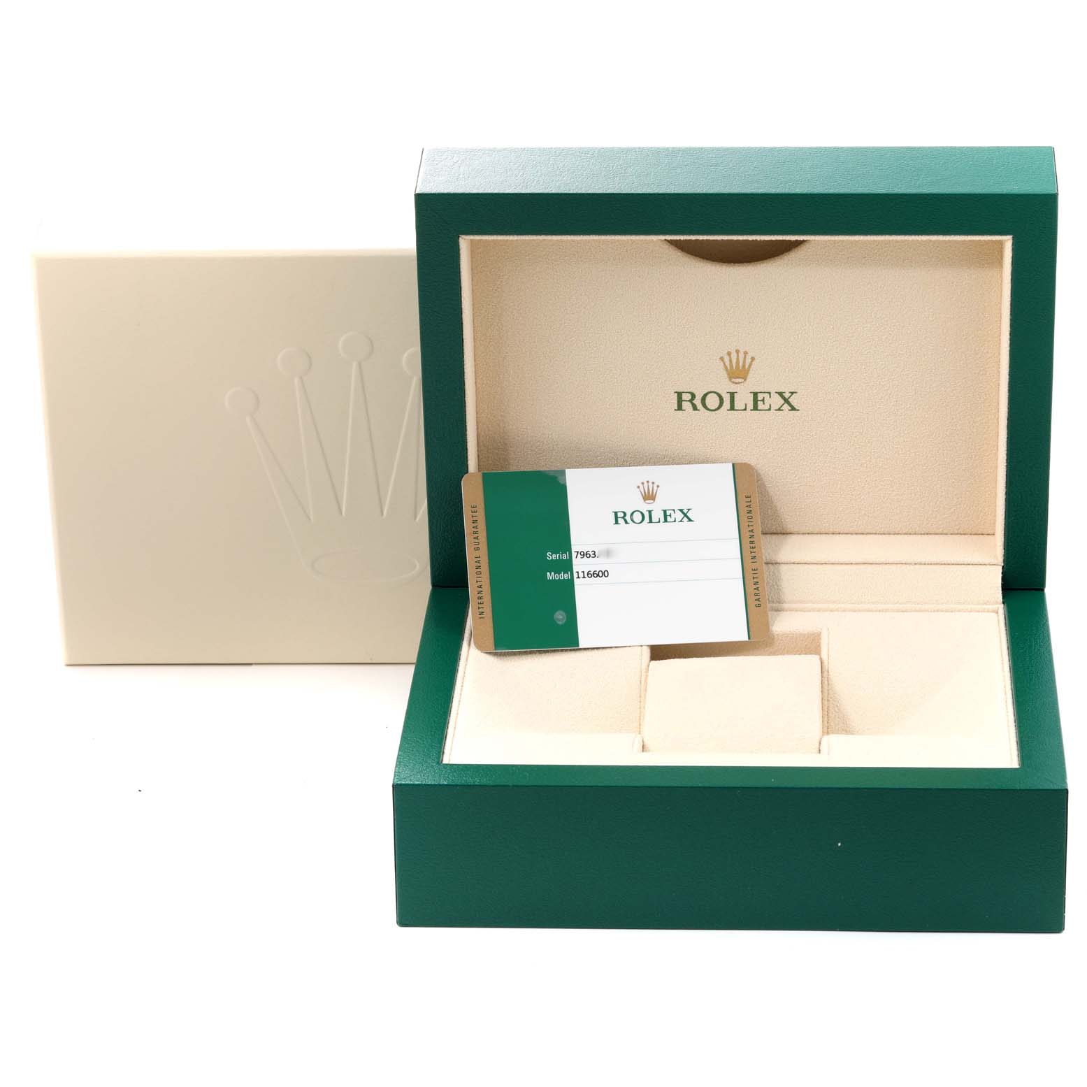 The image shows the box and warranty card of a Rolex Sea-Dweller 116600 Men
s Stainless Steel Black Dial 116600 Men
s Stainless Steel Black Dial model, angled to display the interior of the box.