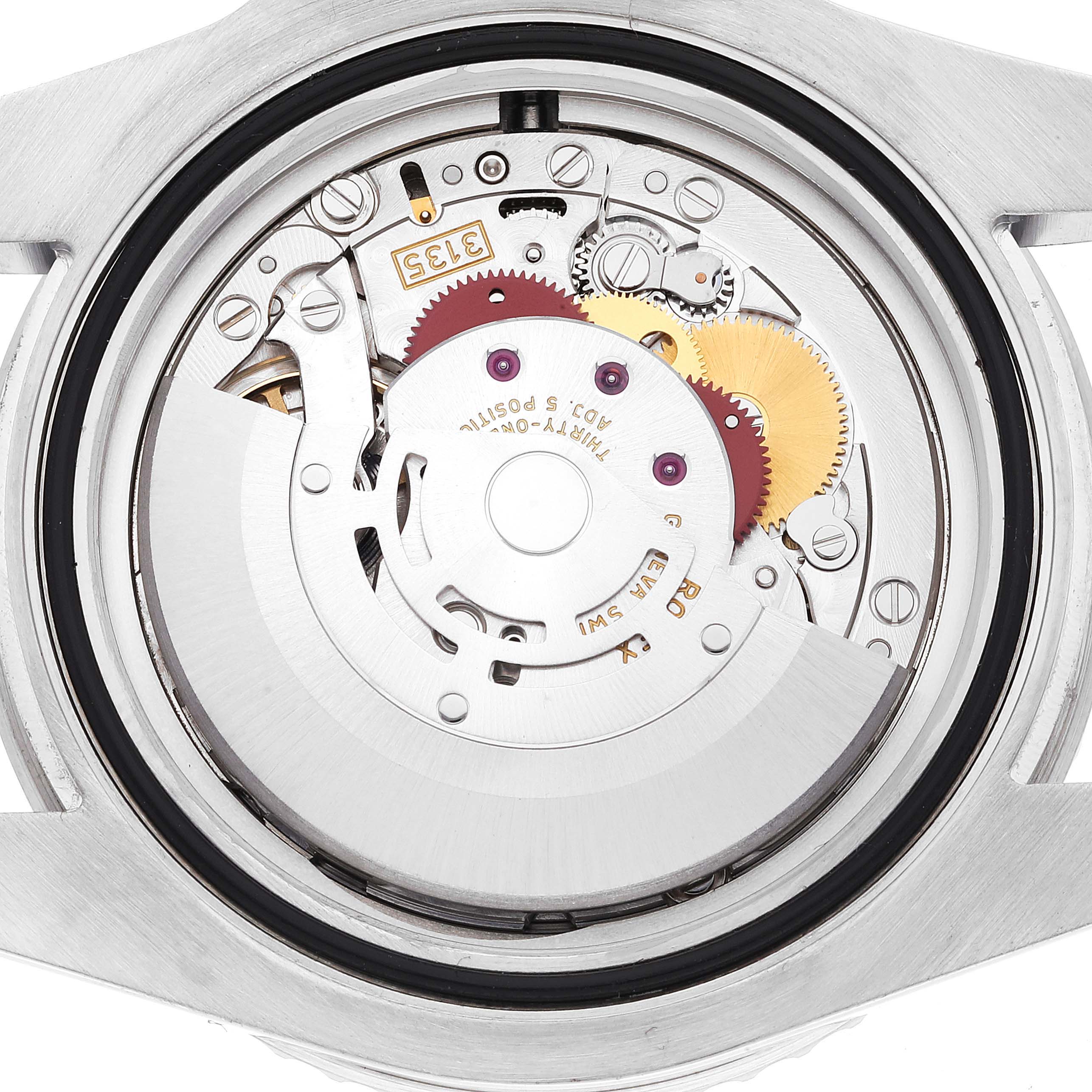 The image shows the movement and internal mechanisms of the Rolex Submariner 116610 Men's Stainless Steel Black Dial 116610 Men's Stainless Steel Black Dial watch, viewed from the back case.