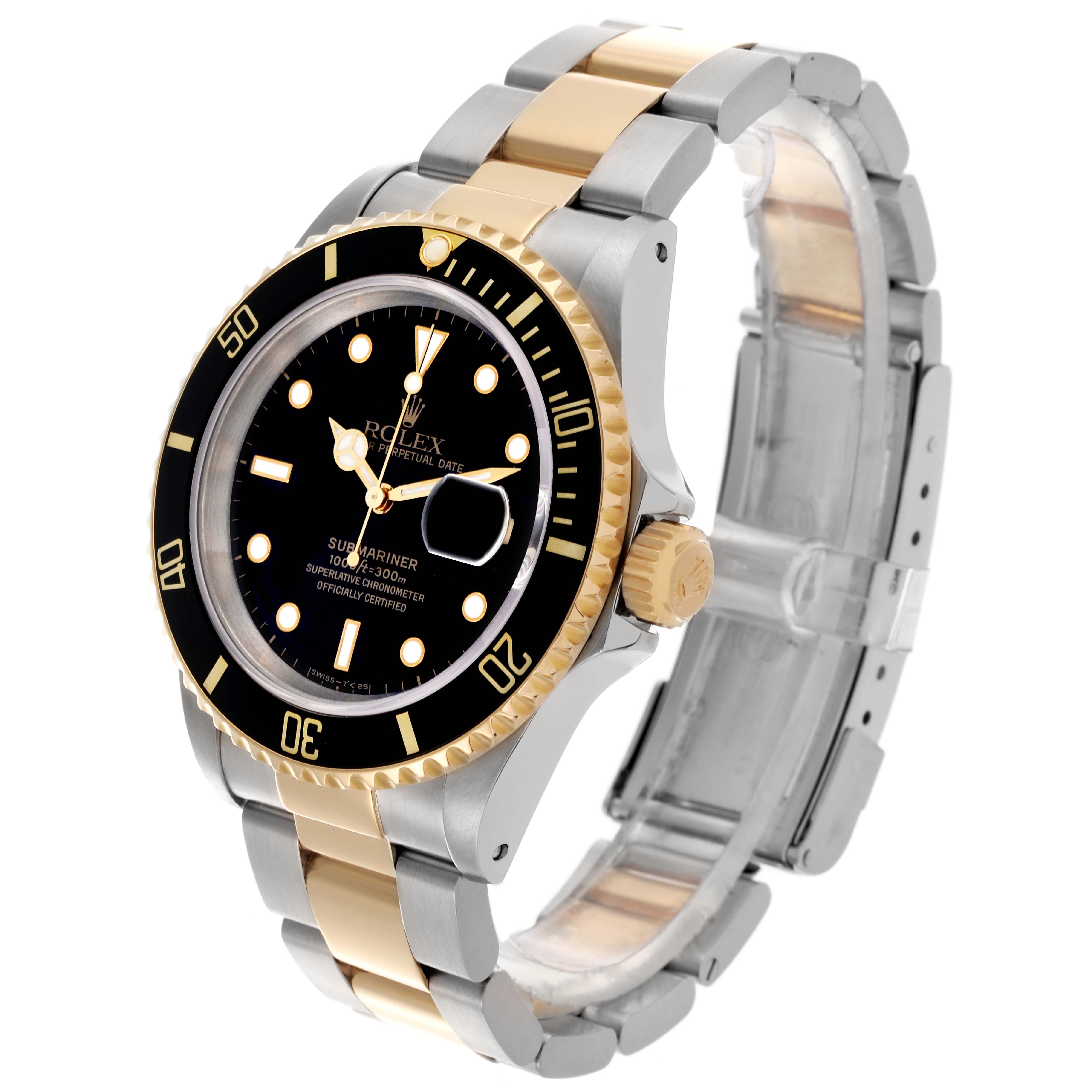 The Rolex Submariner 16613 Men's Steel and Gold (two tone) Black Dial 16613 Men's Steel and Gold (two tone) Black Dial is shown from an angled view highlighting the bezel, dial, bracelet, and clasp.
