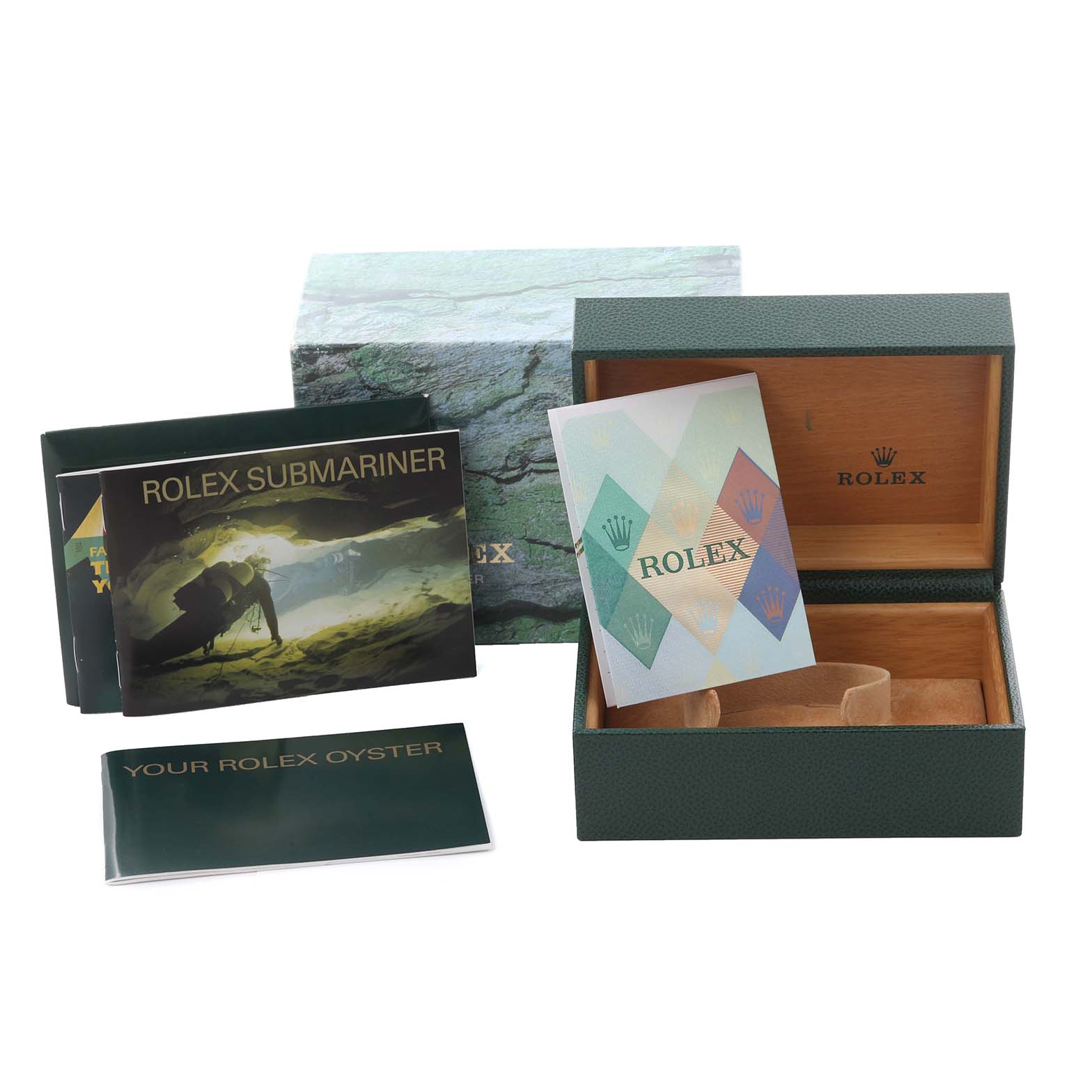 The image shows the packaging and manuals for the Rolex Submariner 16613 Men's Steel and Gold (two tone) Blue Dial 16613 Men's Steel and Gold (two tone) Blue Dial, including a green box and instructional booklets.