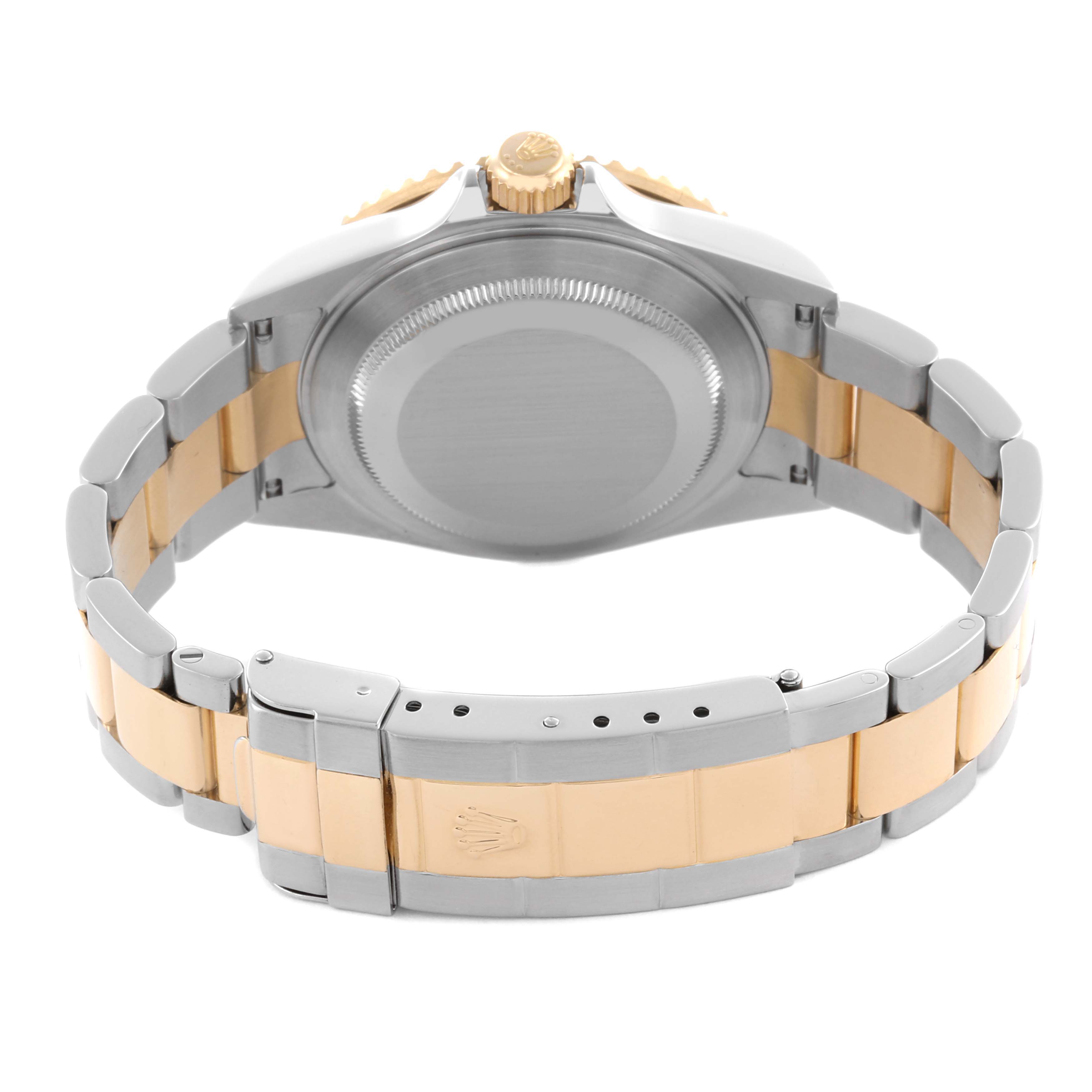 The image shows the back case and bracelet of a Rolex Submariner 16613 Men's Steel and Gold (two tone) Blue Dial 16613 Men's Steel and Gold (two tone) Blue Dial watch from the rear angle.