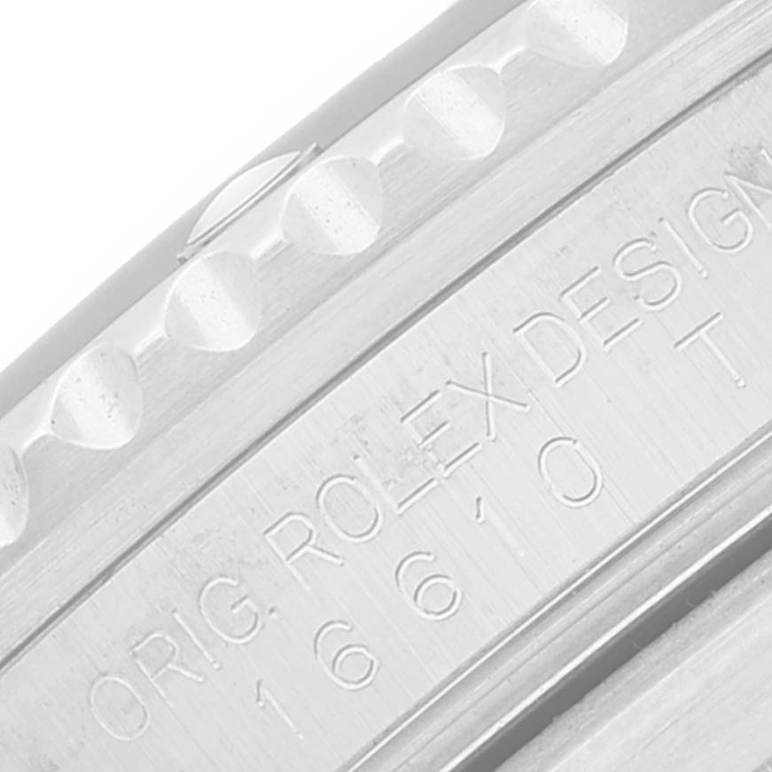The image shows a close-up angle of the engraved bezel and case side of a Rolex Submariner 16610 Men's Stainless Steel Black Dial 16610 Men's Stainless Steel Black Dial watch.