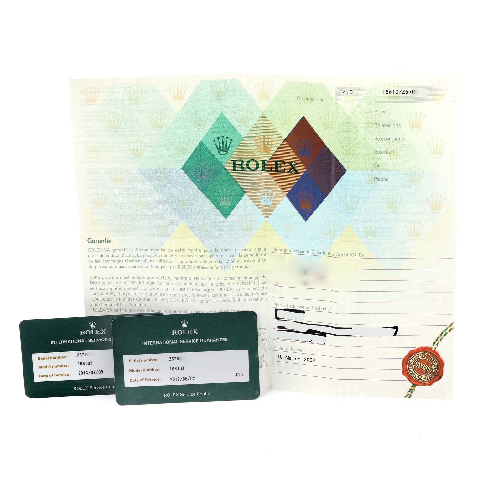 This image shows warranty documents and international service guarantee cards for a Rolex Submariner 16610 Men
s Stainless Steel Black Dial 16610 Men
s Stainless Steel Black Dial watch.