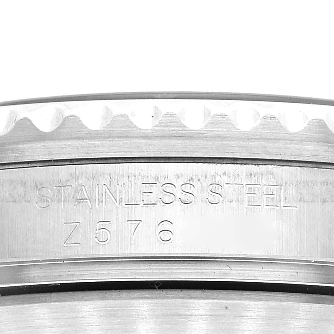 This close-up image shows the engraved serial number and "STAINLESS STEEL" marking on the case back of the Rolex Submariner 16610 Men
s Stainless Steel Black Dial 16610 Men
s Stainless Steel Black Dial watch.