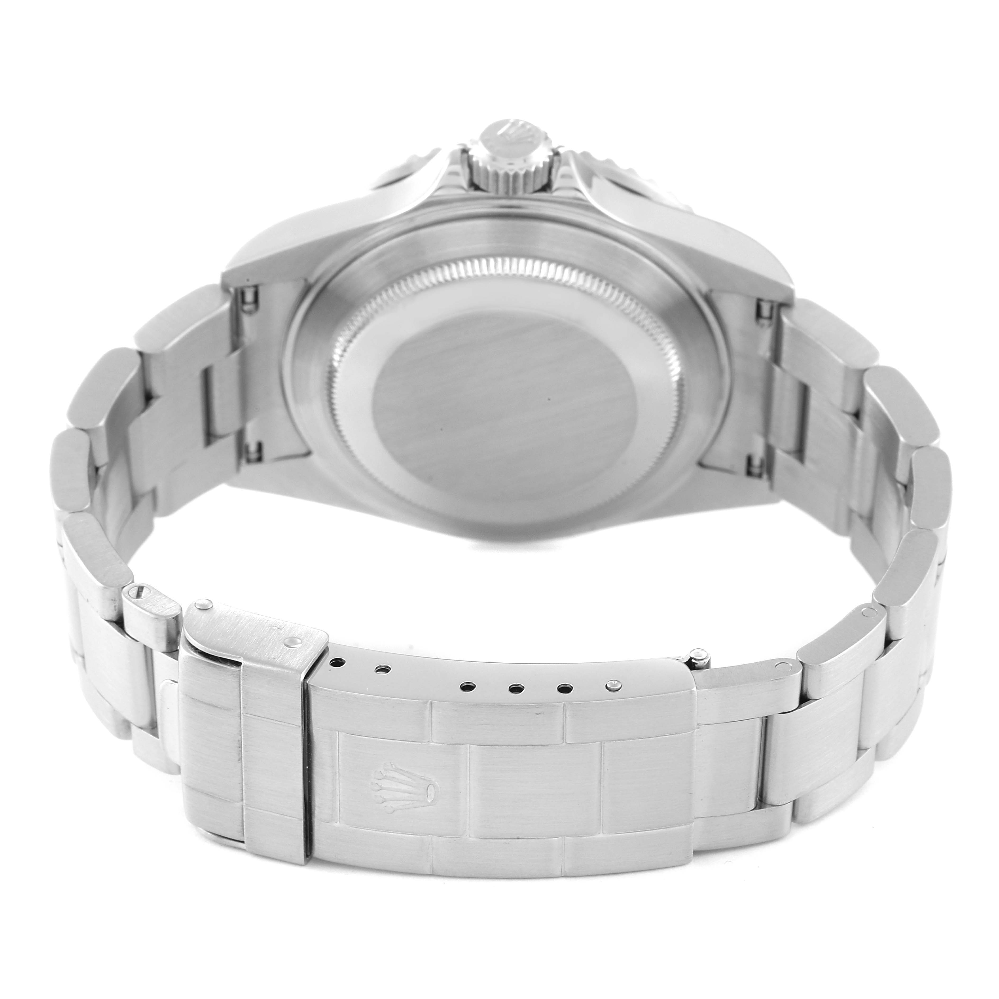 The image shows the back of a Rolex Submariner 16610 Men
s Stainless Steel Black Dial 16610 Men
s Stainless Steel Black Dial watch, highlighting its stainless steel case, bracelet, and clasp.