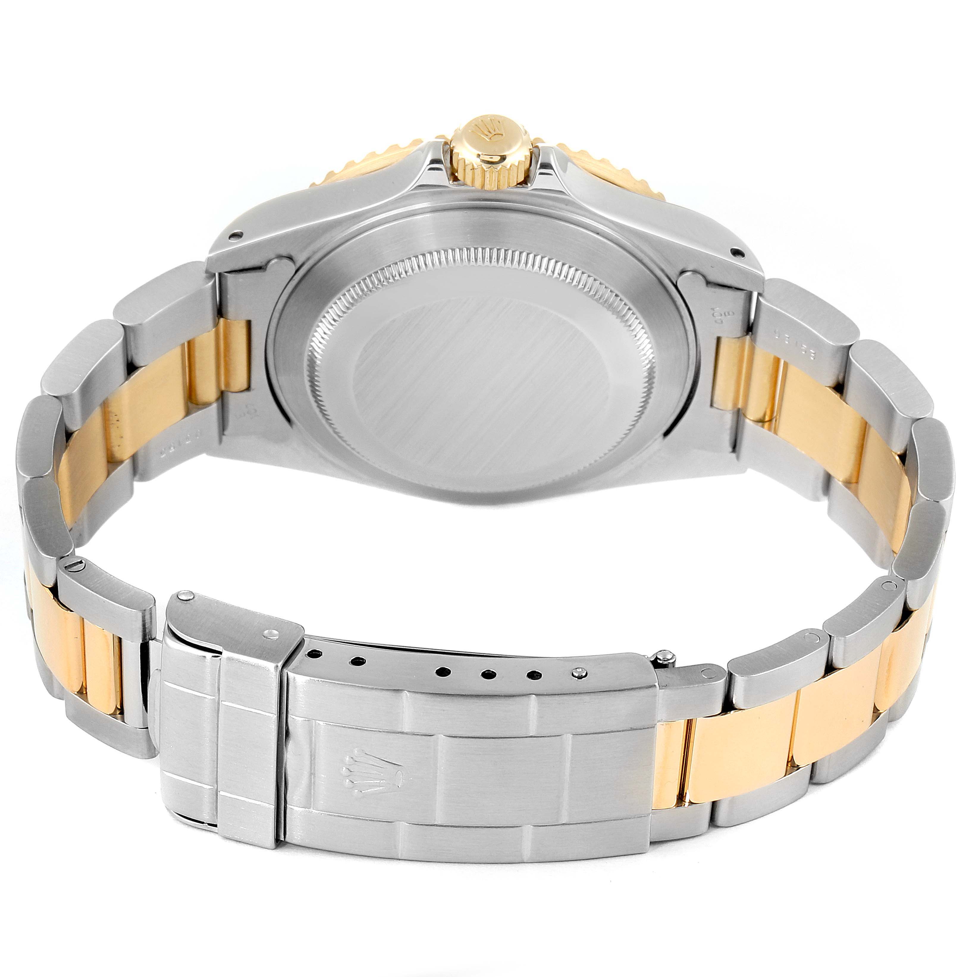 This image shows the back view of a Rolex Submariner 16613 Men's Steel and Gold (two tone) Champagne Dial 16613 Men's Steel and Gold (two tone) Champagne Dial watch, highlighting the clasp and bracelet.
