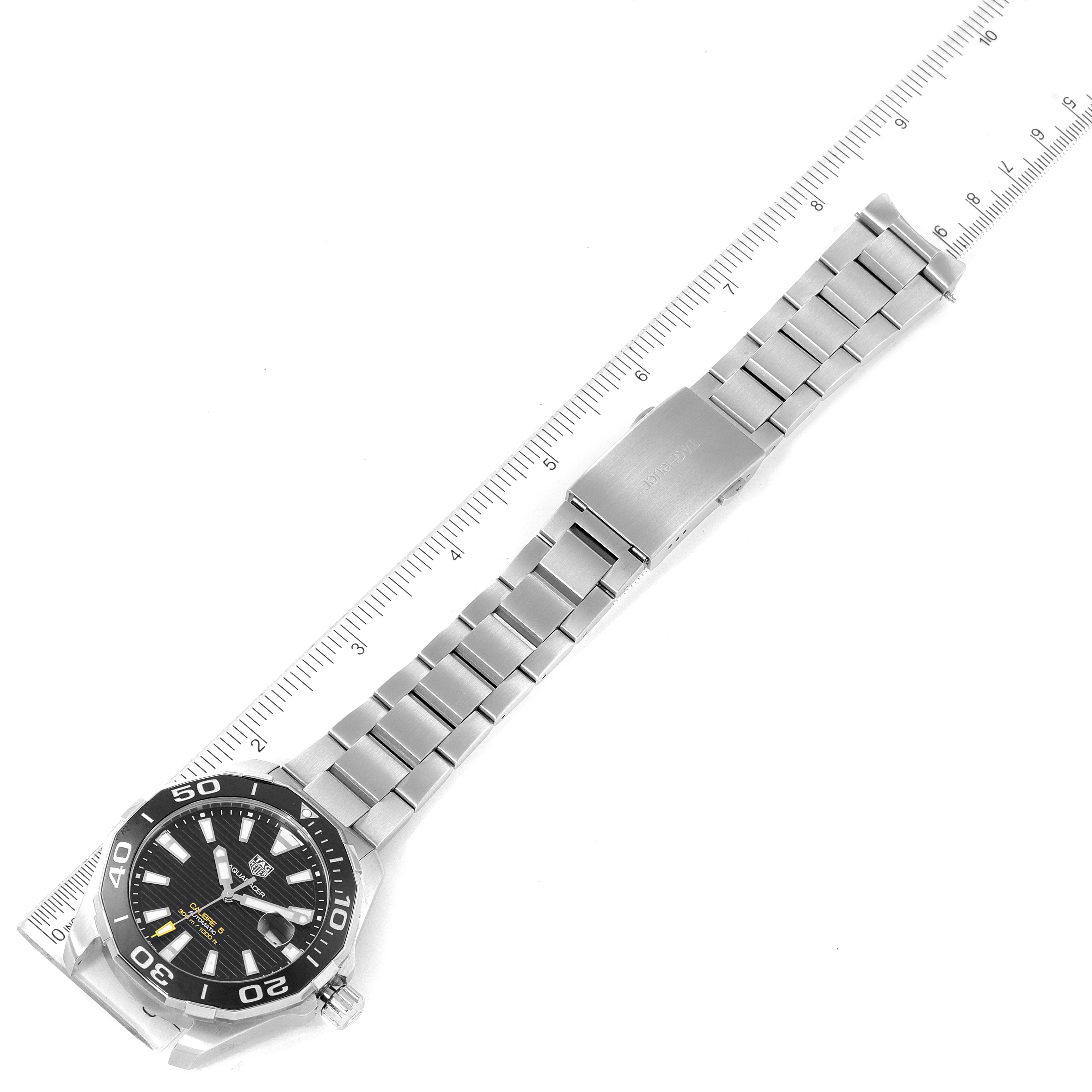 The image shows a Tag Heuer Aquaracer WAY201A.BA0927 Men's Stainless Steel Black Dial WAY201A.BA0927 Men's Stainless Steel Black Dial watch with a stainless steel bracelet, displayed flat alongside a ruler for scale.