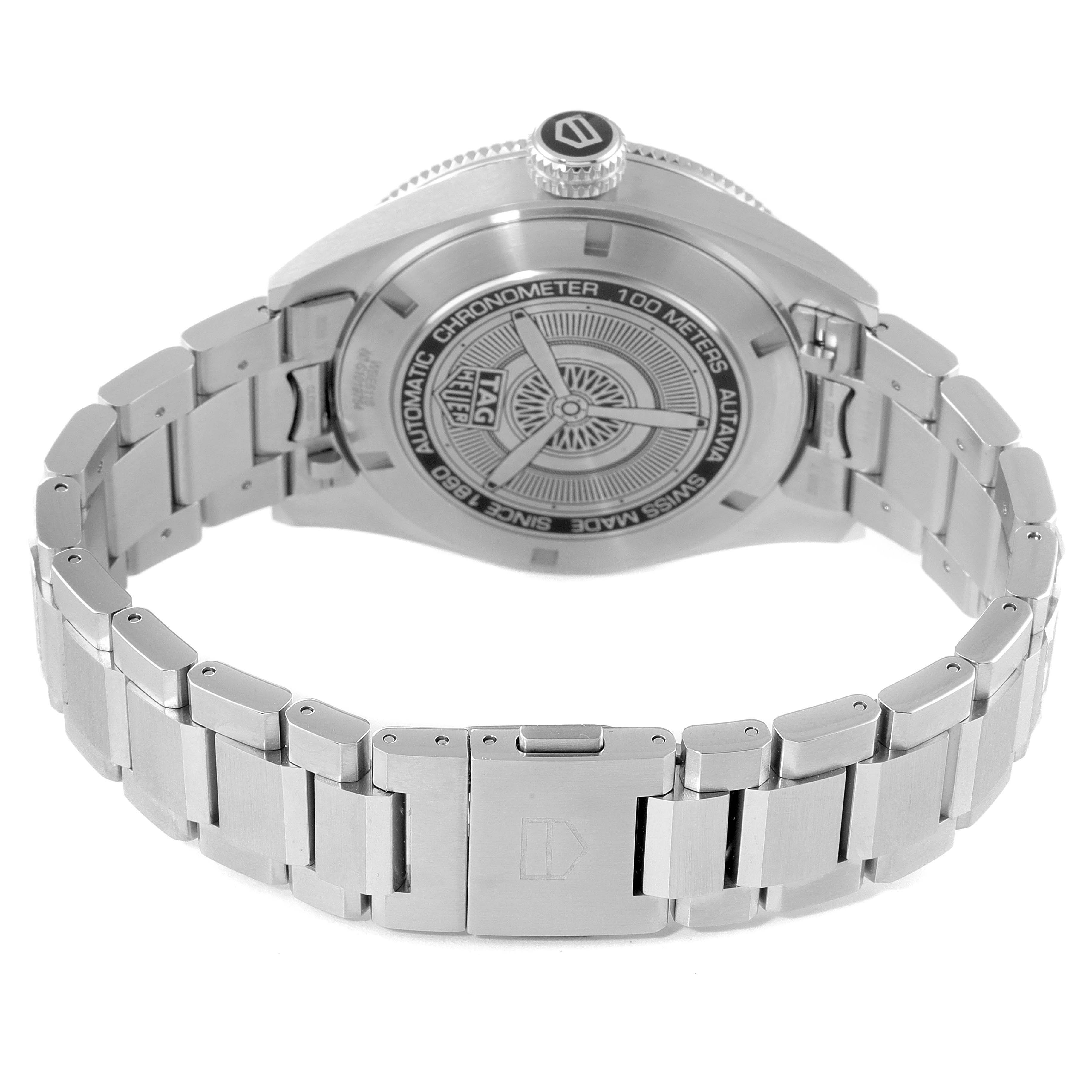This image shows the back view of a Tag Heuer Autavia WBE5116.EB0173 Men's Stainless Steel Blue Dial WBE5116.EB0173 Men's Stainless Steel Blue Dial watch, displaying its case back, crown, and bracelet.