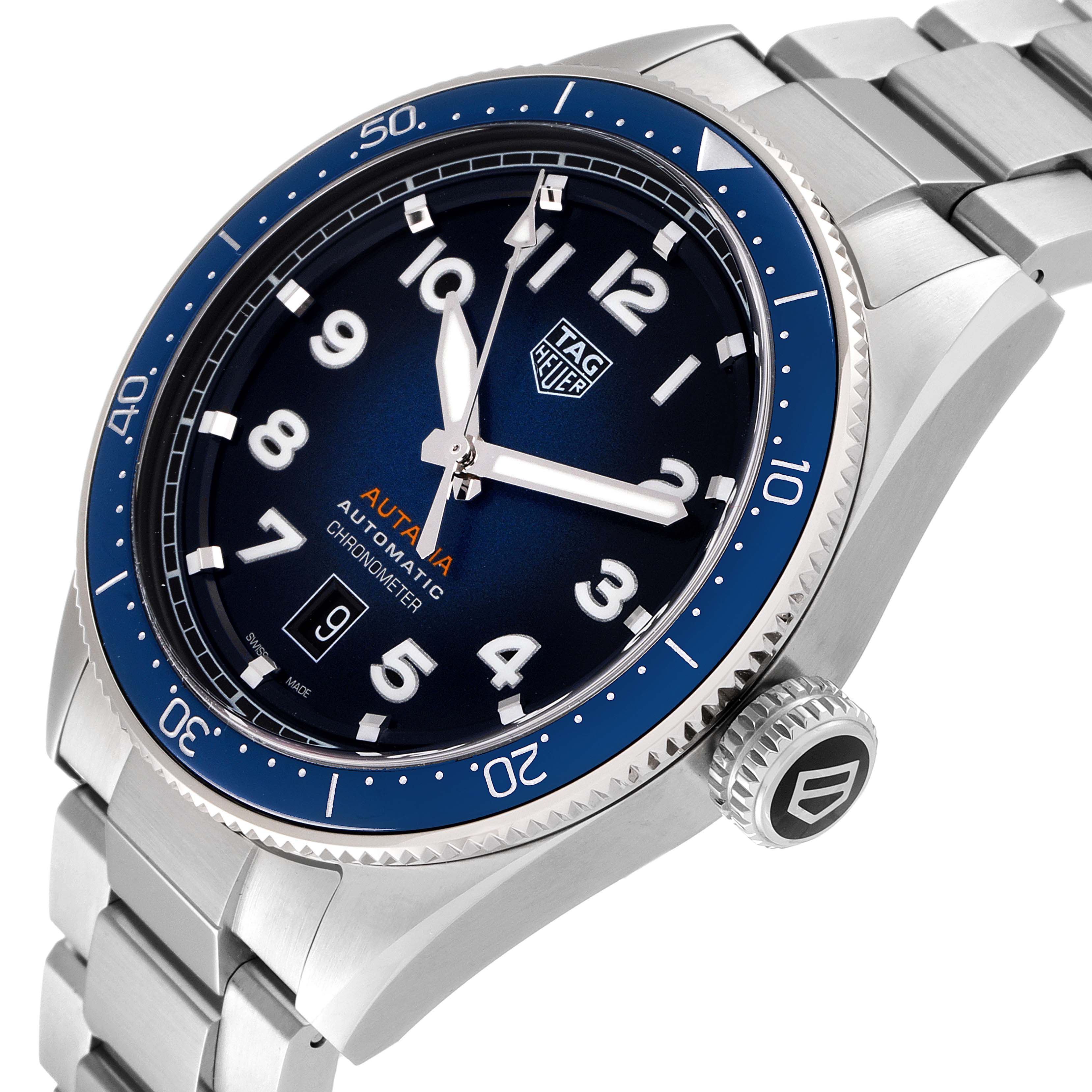 The image shows a close-up side angle of the Tag Heuer Autavia WBE5116.EB0173 Men's Stainless Steel Blue Dial WBE5116.EB0173 Men's Stainless Steel Blue Dial watch, highlighting its blue dial, bezel, crown, and metal bracelet.