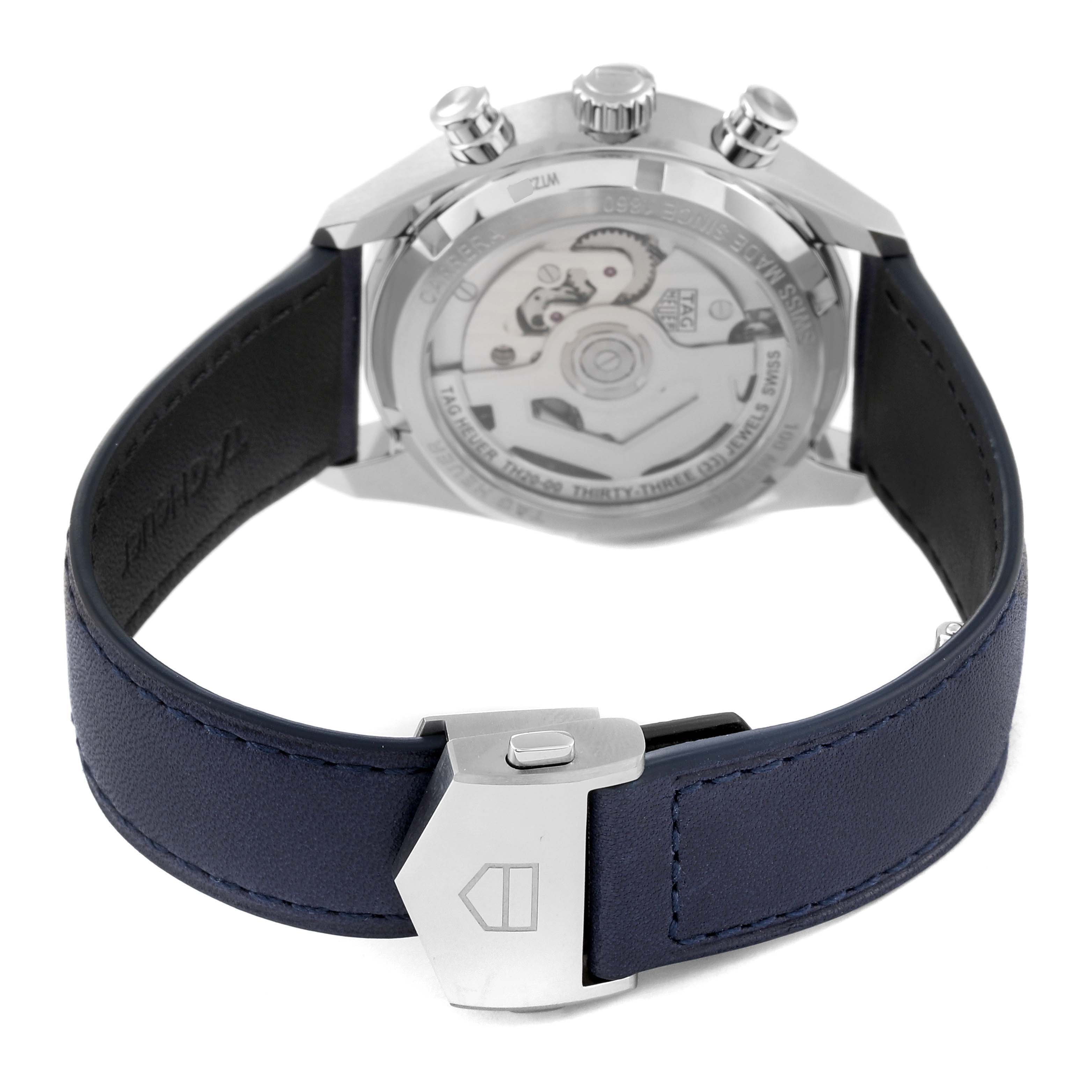 The image shows the back view of the Tag Heuer Carrera CBS2212.FC6535 Men's Stainless Steel Blue Dial CBS2212.FC6535 Men's Stainless Steel Blue Dial watch, highlighting the transparent case back and the strap clasp.