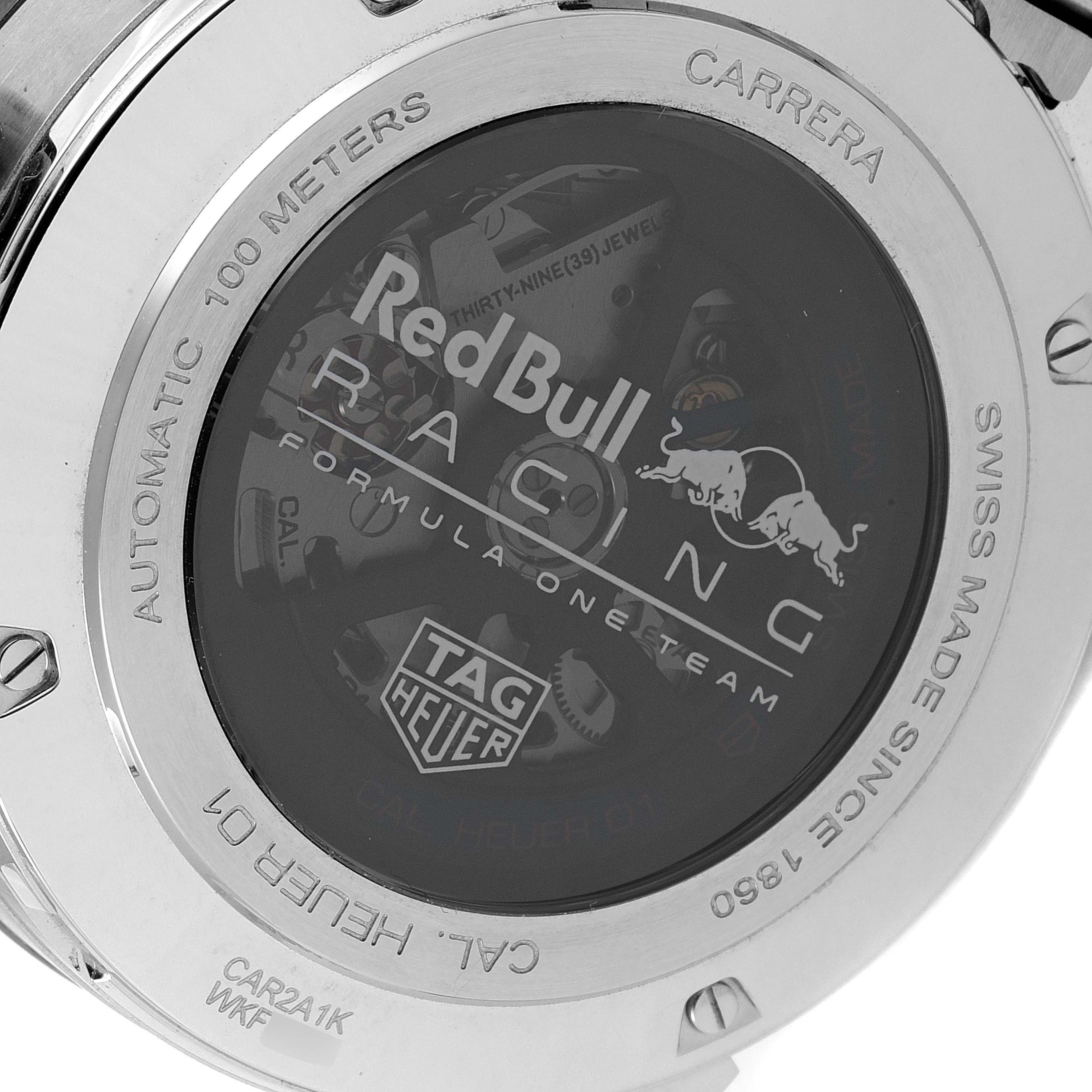 This image shows the back case of a Tag Heuer Carrera CAR2A1K.BA0703 Men
s Stainless Steel Blue Dial CAR2A1K.BA0703 Men
s Stainless Steel Blue Dial watch with a Red Bull Racing inscription.