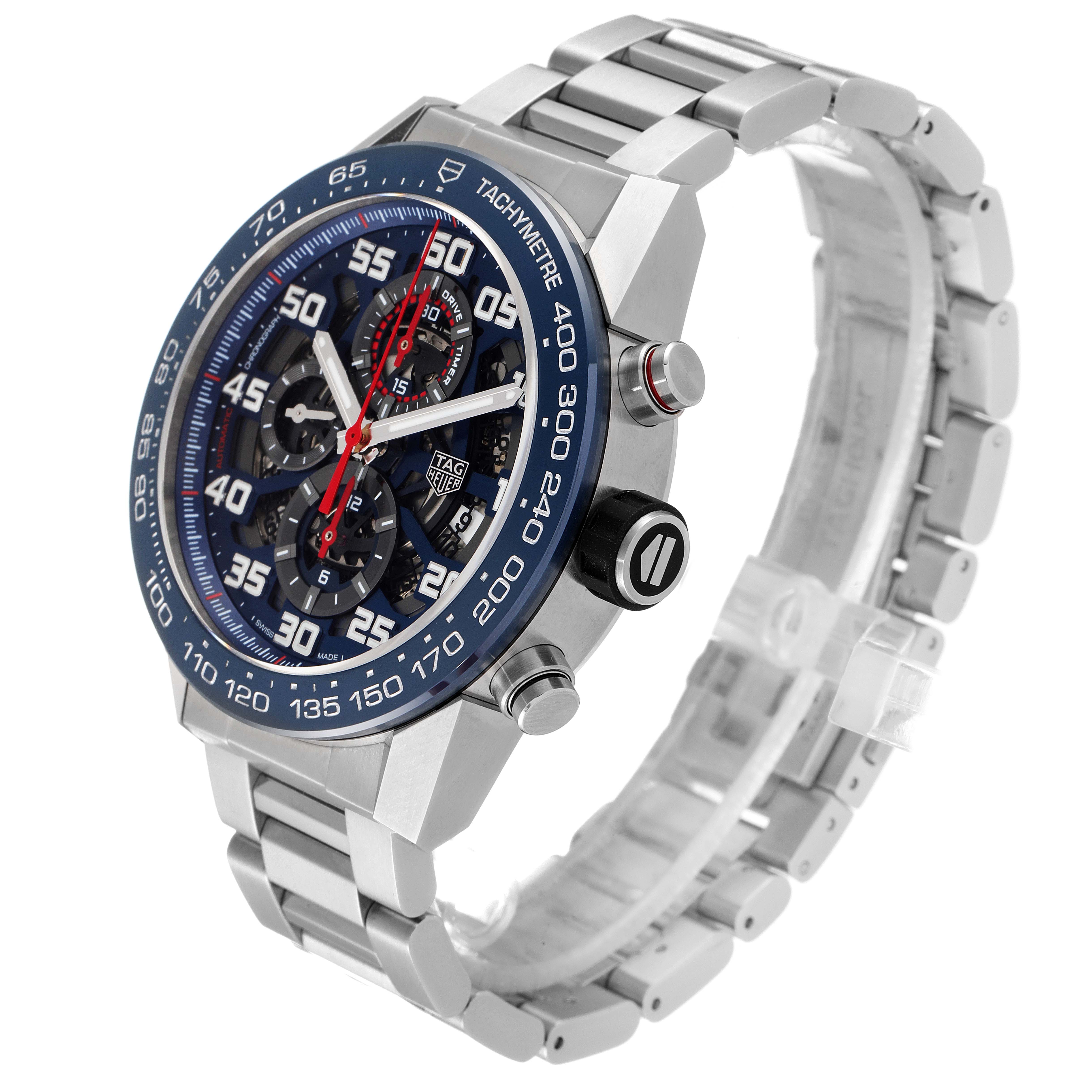 The image shows a Tag Heuer Carrera CAR2A1K.BA0703 Men
s Stainless Steel Blue Dial CAR2A1K.BA0703 Men
s Stainless Steel Blue Dial watch at a three-quarter angle, highlighting the face, tachymeter bezel, crown, and bracelet.