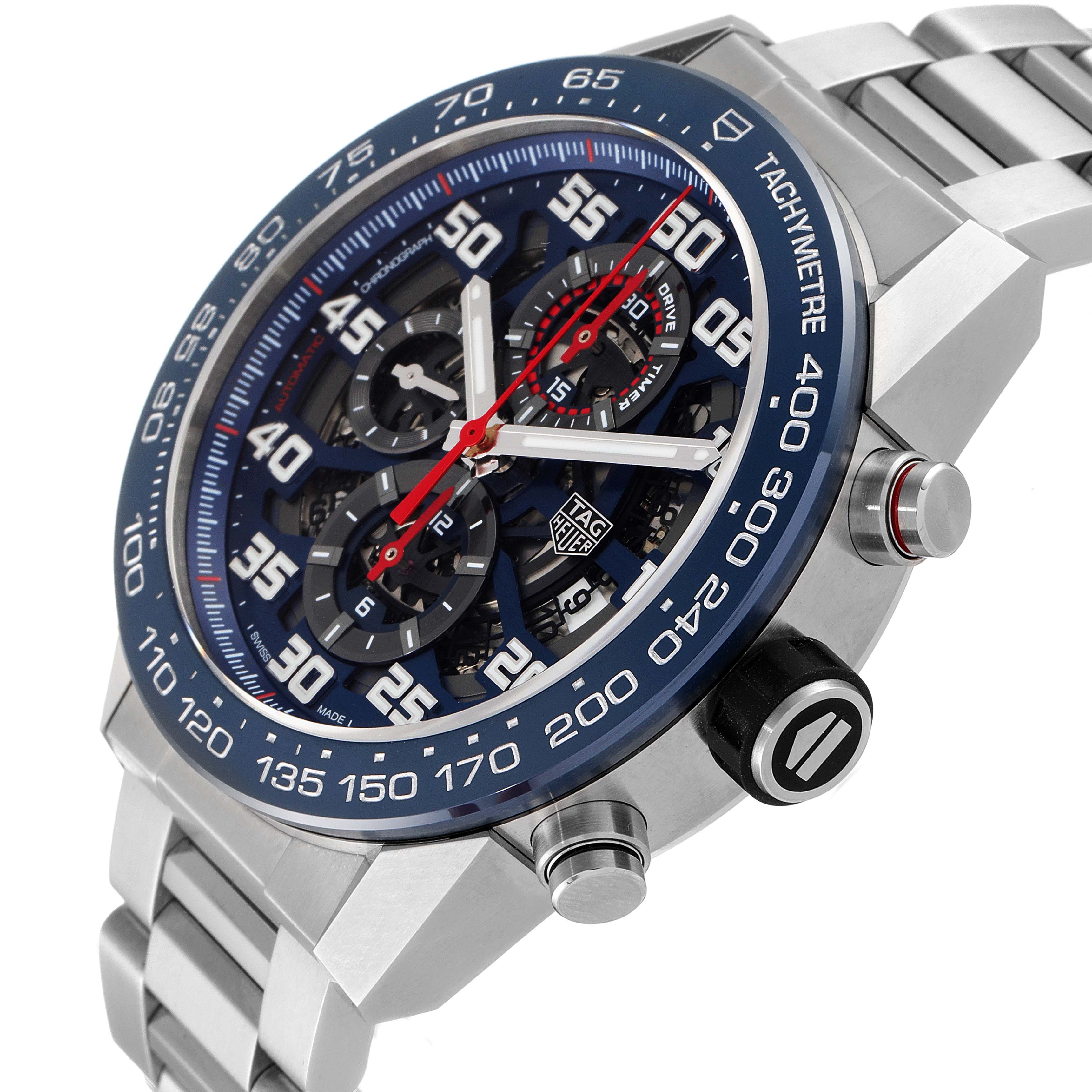 The image shows a close-up side angle of a Tag Heuer Carrera CAR2A1K.BA0703 Men
s Stainless Steel Blue Dial CAR2A1K.BA0703 Men
s Stainless Steel Blue Dial watch, highlighting its dial, tachymeter, and metal bracelet.